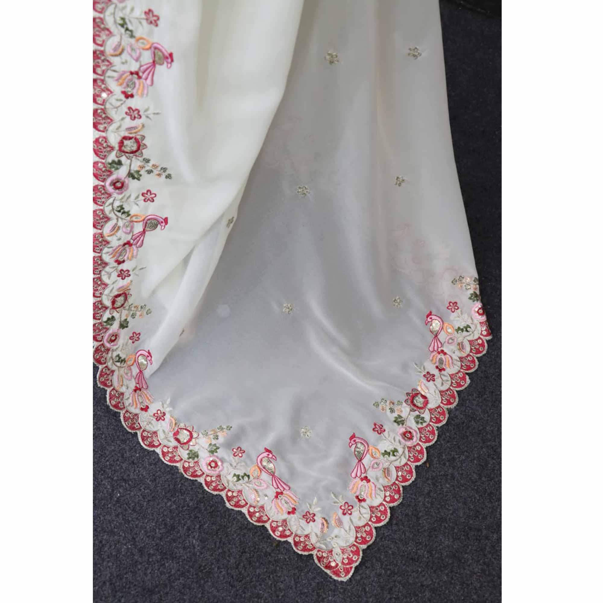 Stylish Off White Georgette Partywear Saree with Beautifully Embroidered Border Detailing