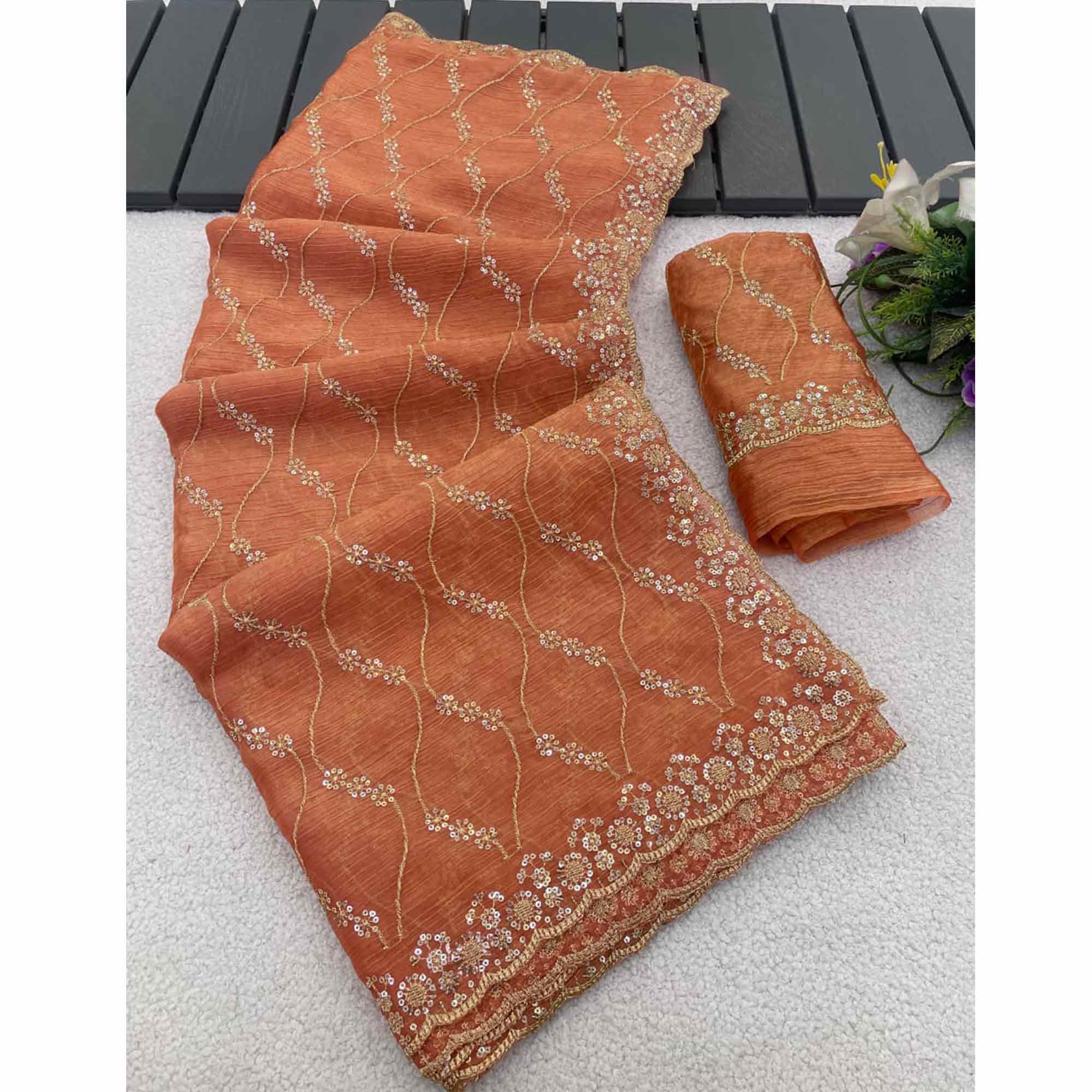Orange Partywear Organza Chiffon Silk Saree Highlighted with Fine Sequins Detailing