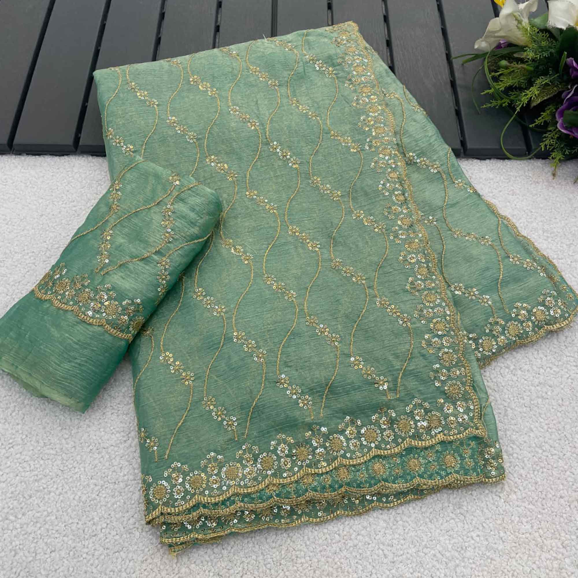 Sea Green Partywear Organza Chiffon Silk Saree Highlighted with Fine Sequins Detailing