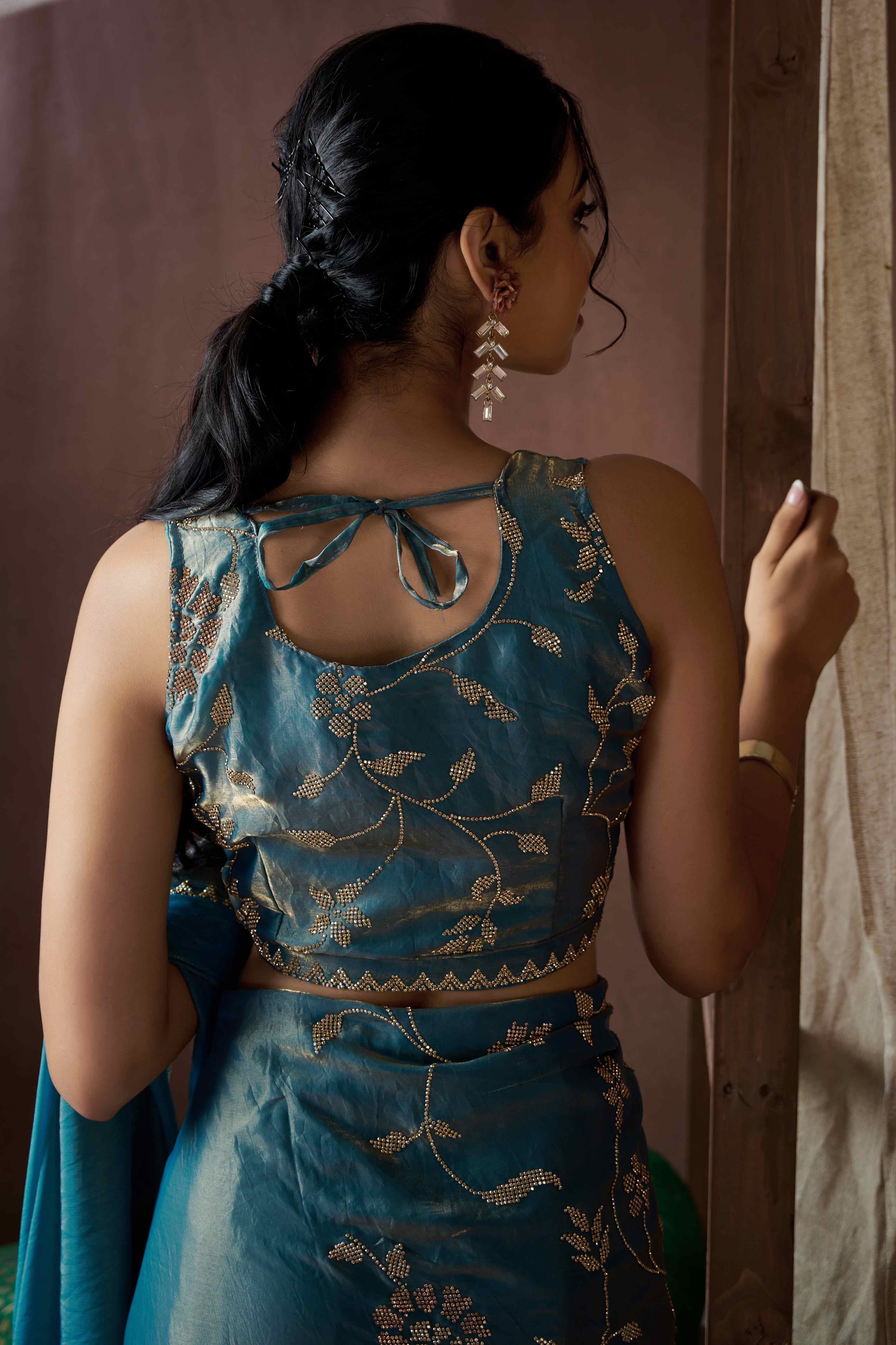 Sky Blue Satin Saree with Exquisite Stone Embellishments