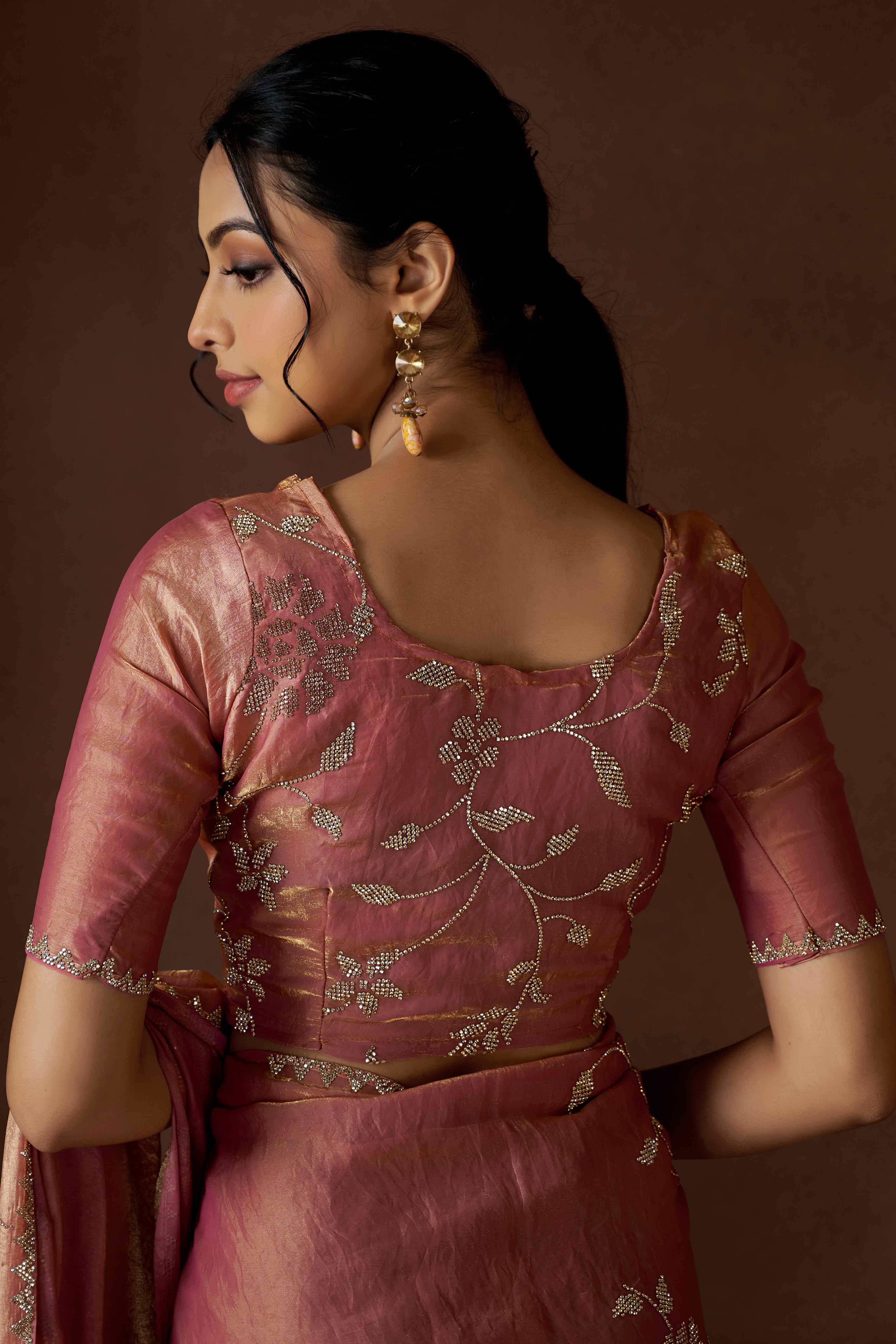 Peach Satin Saree with Exquisite Stone Embellishments