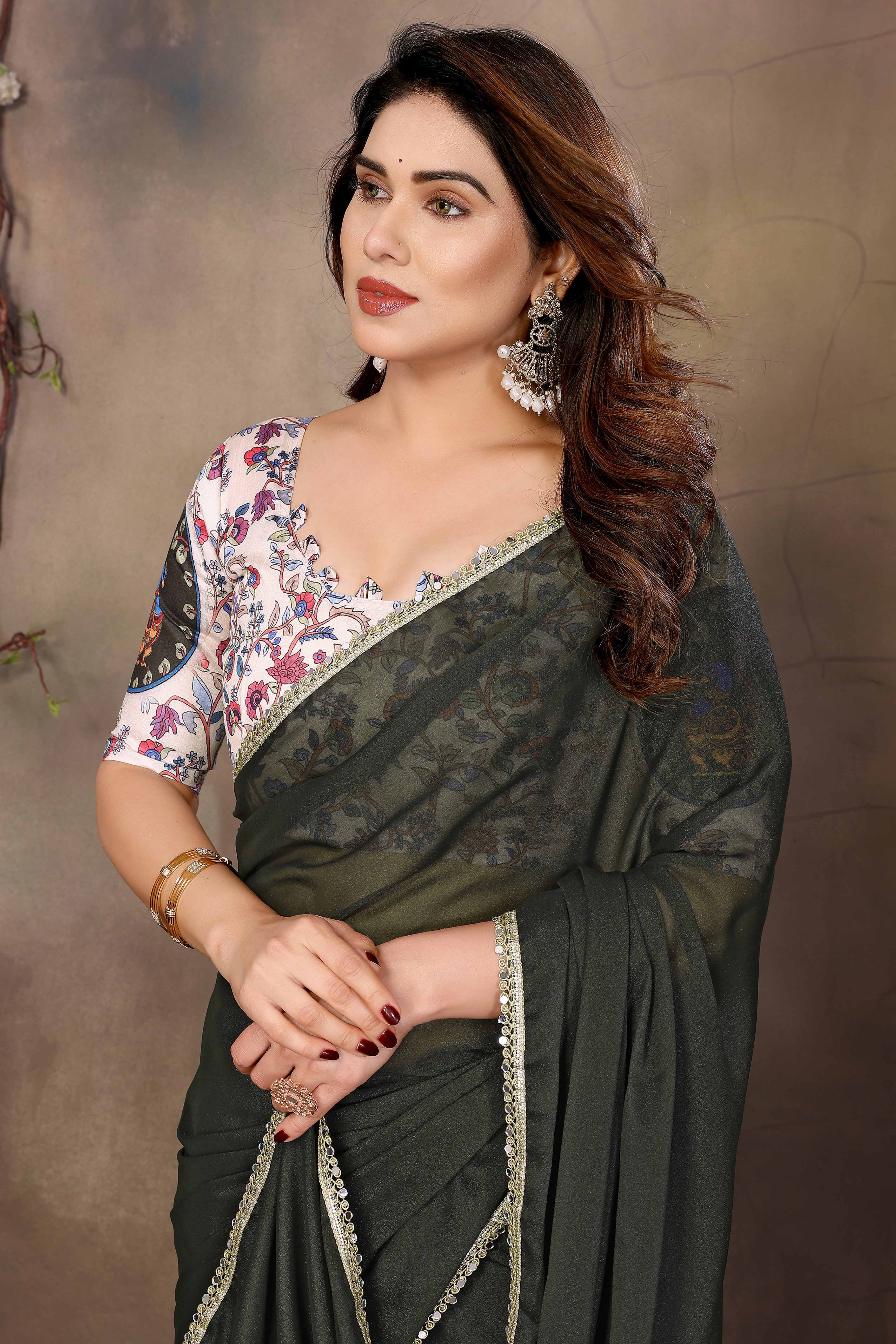 Mehendi Green Solid Sparkling Georgette Saree Enhanced With Shimmering Mirror Border