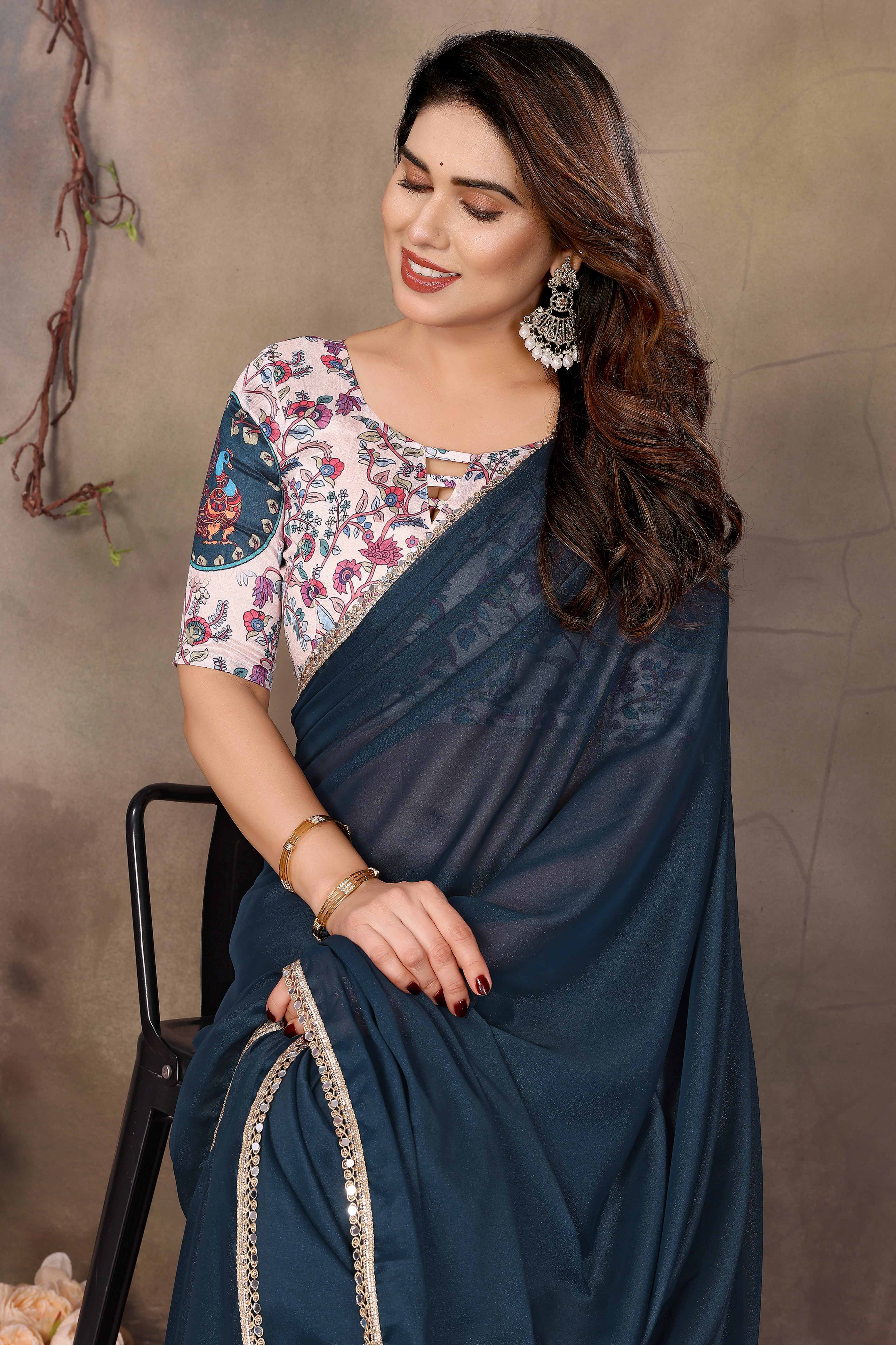Morpich Blue Solid Sparkling Georgette Saree Enhanced With Shimmering Mirror Border