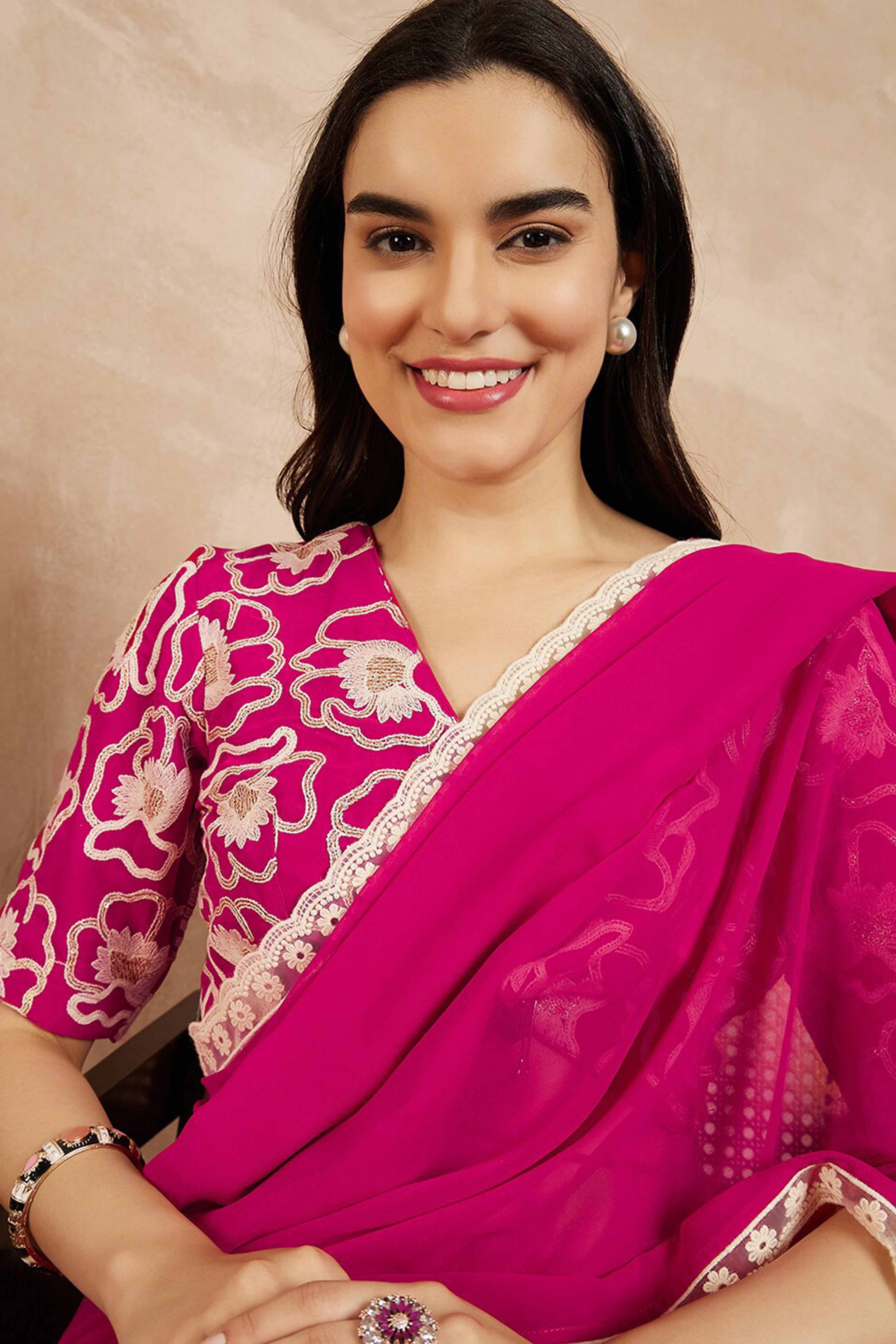 Pink Solid Georgette Saree With Embroidered Border