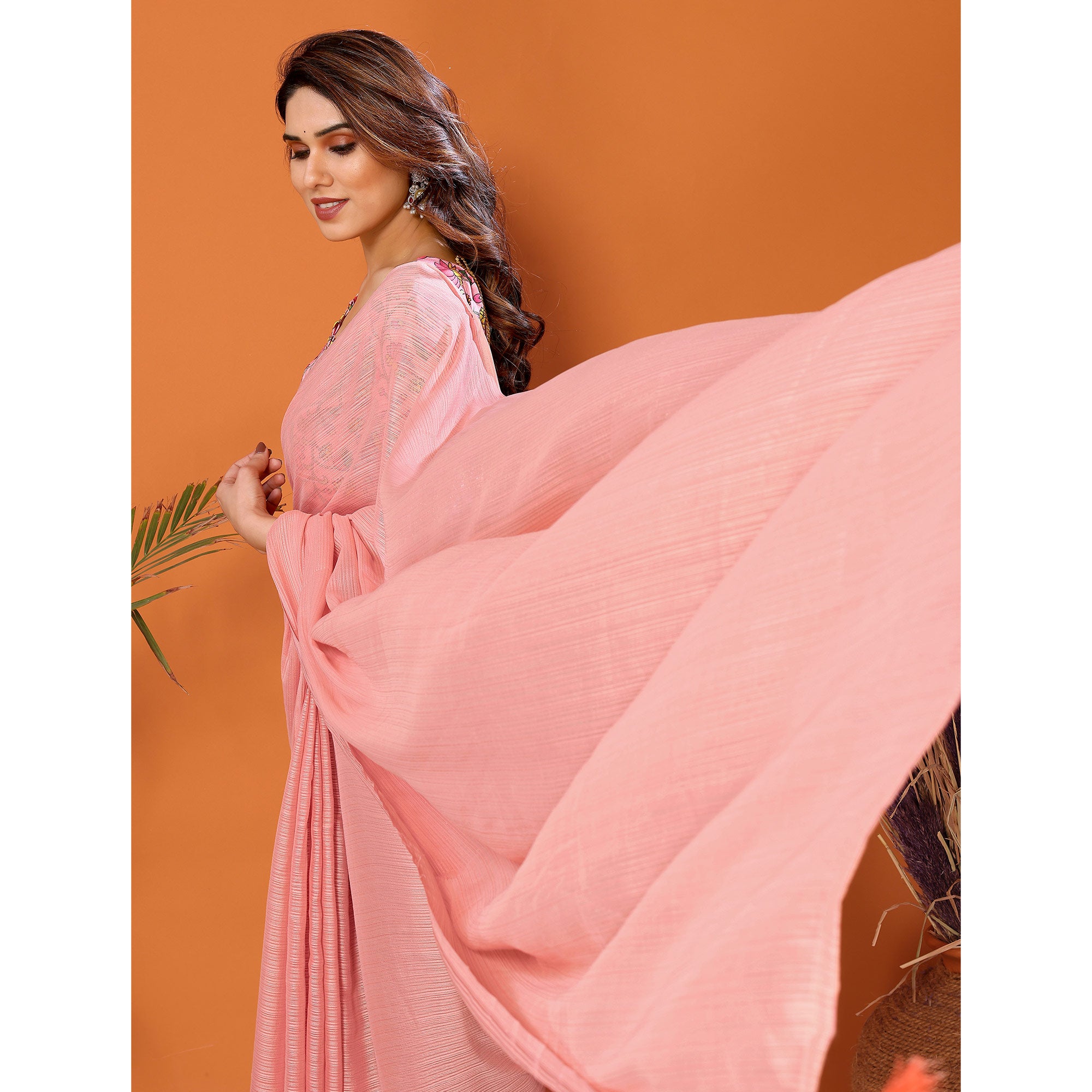 Peach Woven Satin Saree With Tassels