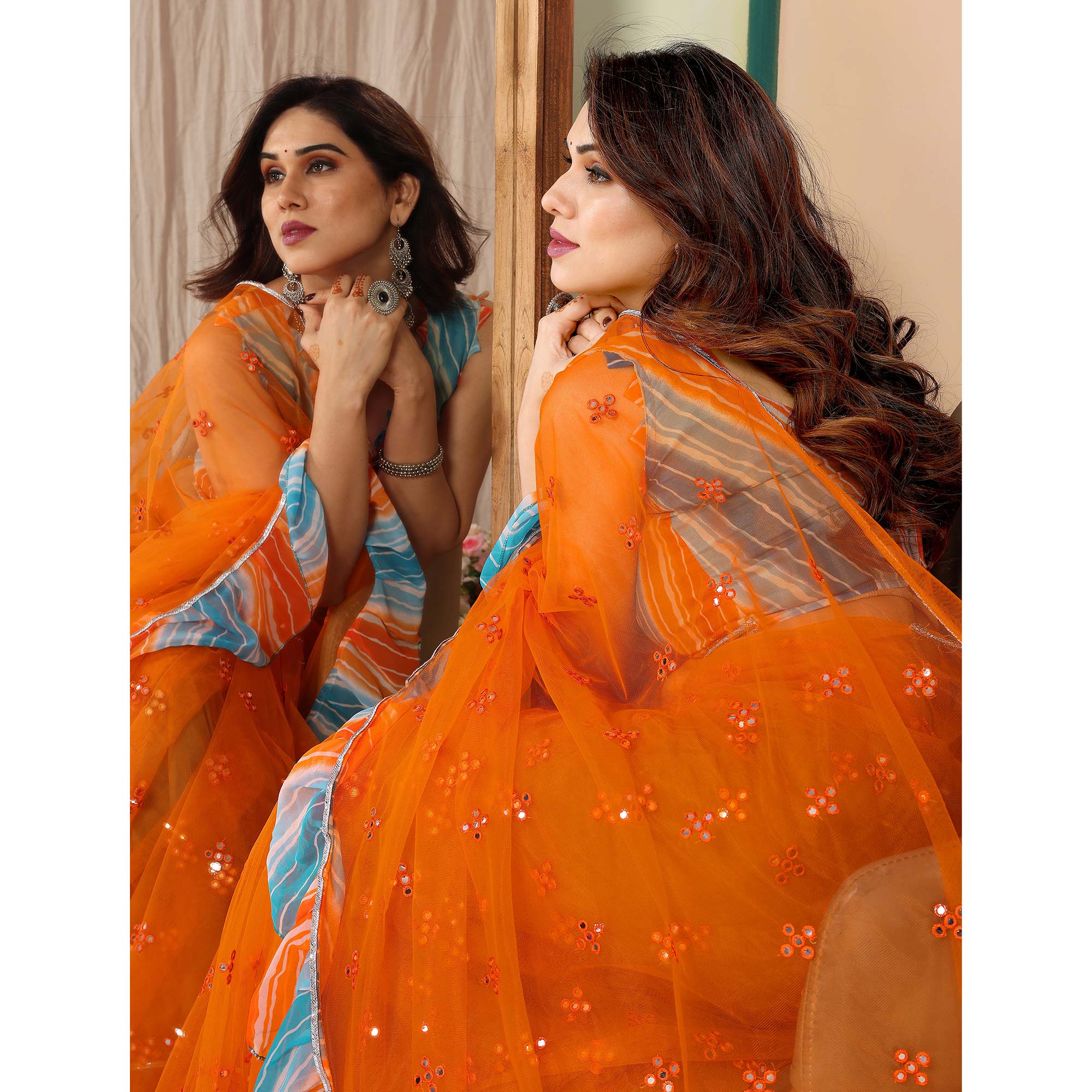 Orange Mirror Work Embroidered Net Ruffle Saree