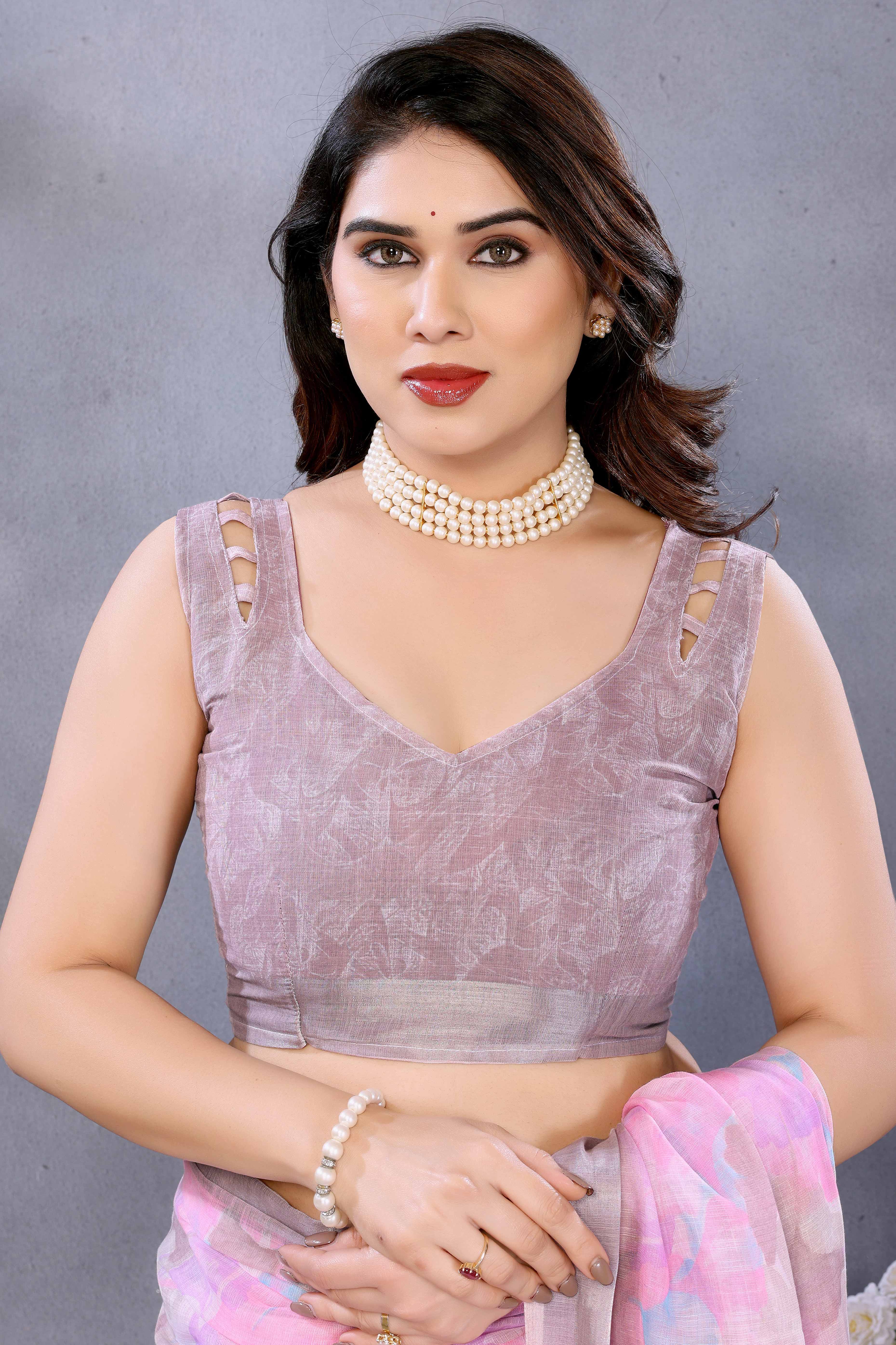 Pink Floral Printed Linen Saree Accented With A Classic Patta Border