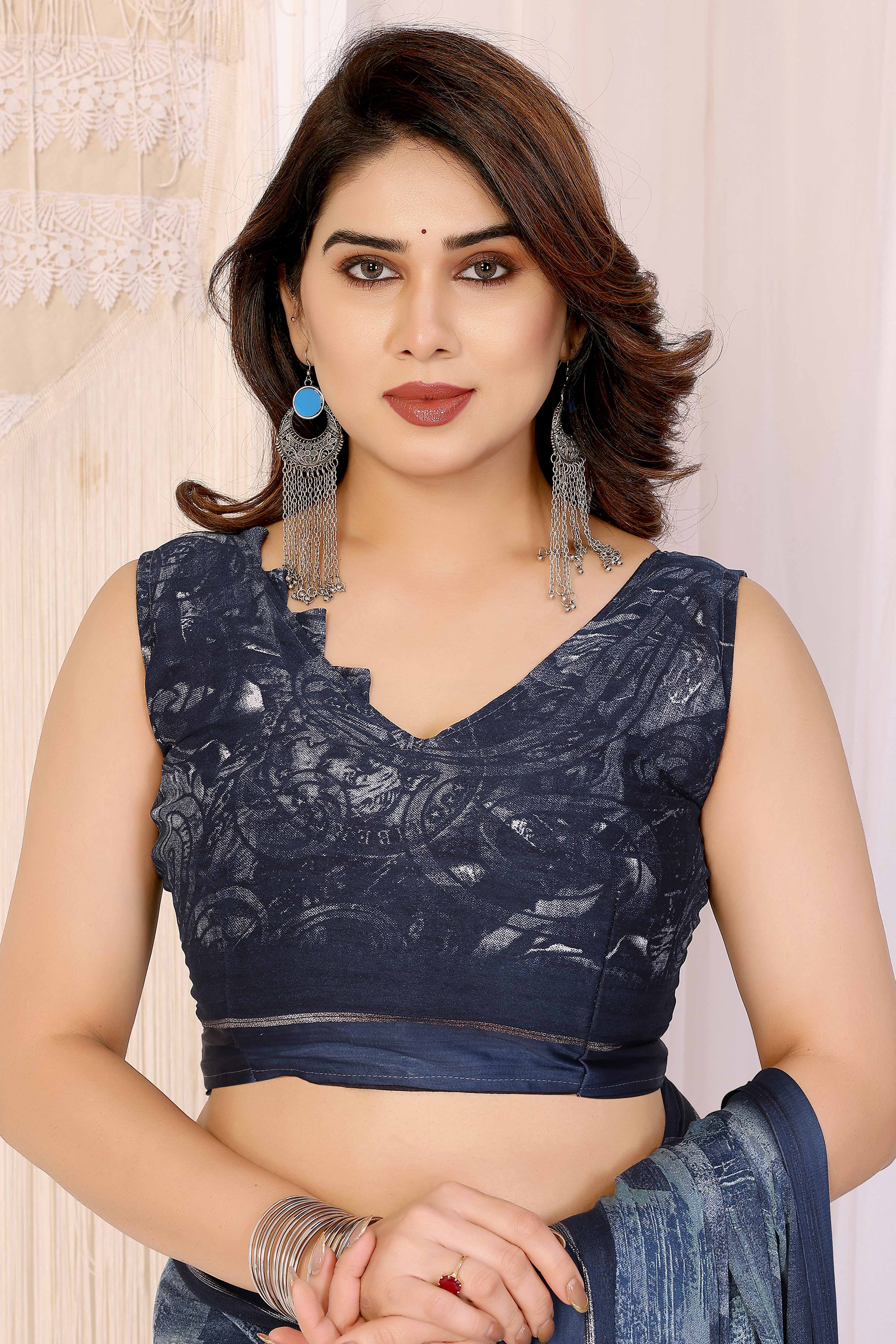 Trendy Blue Moss Crepe Saree with Floral Motifs and Satin Border