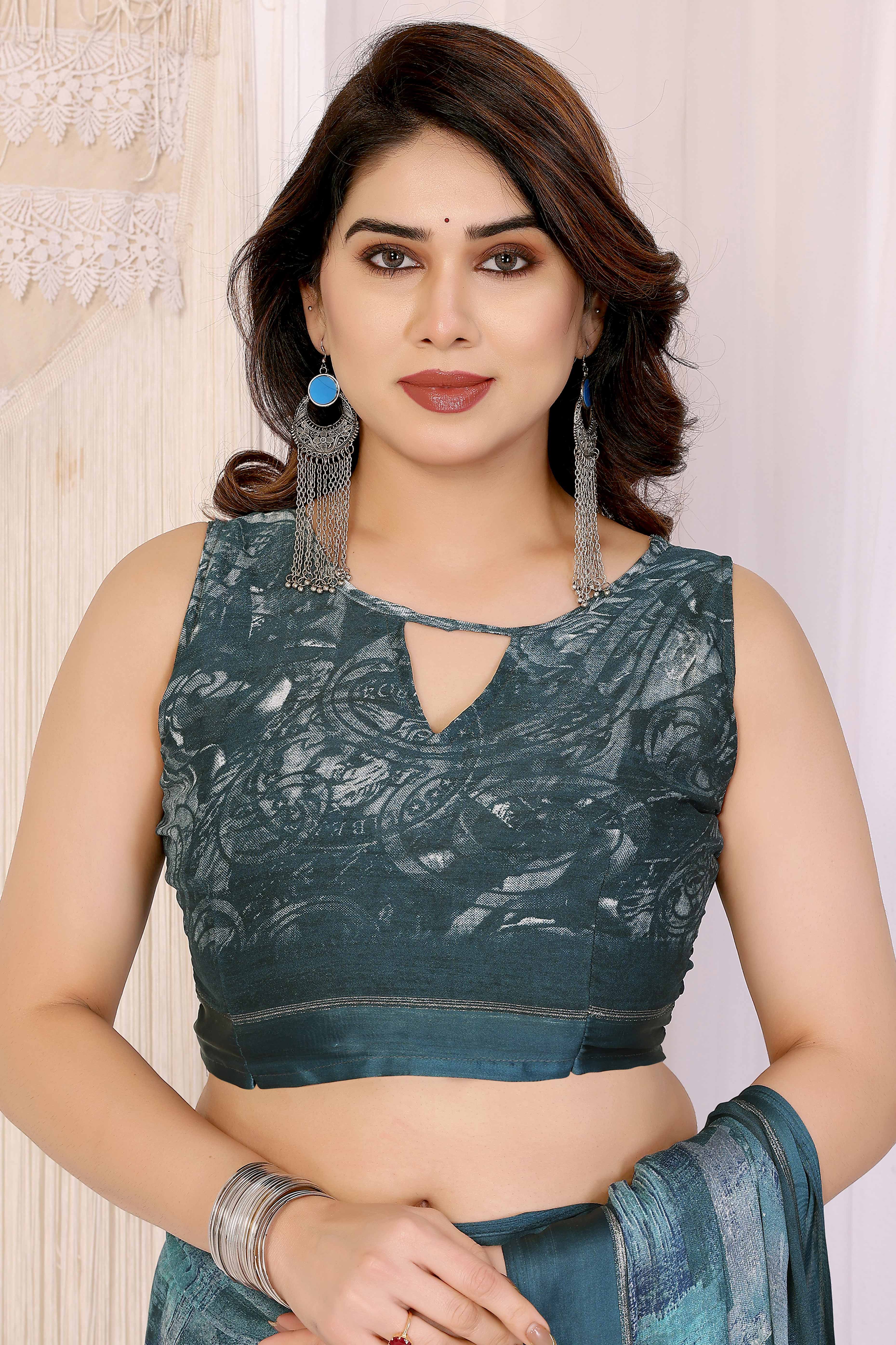 Trendy Teal Moss Crepe Saree with Floral Motifs and Satin Border