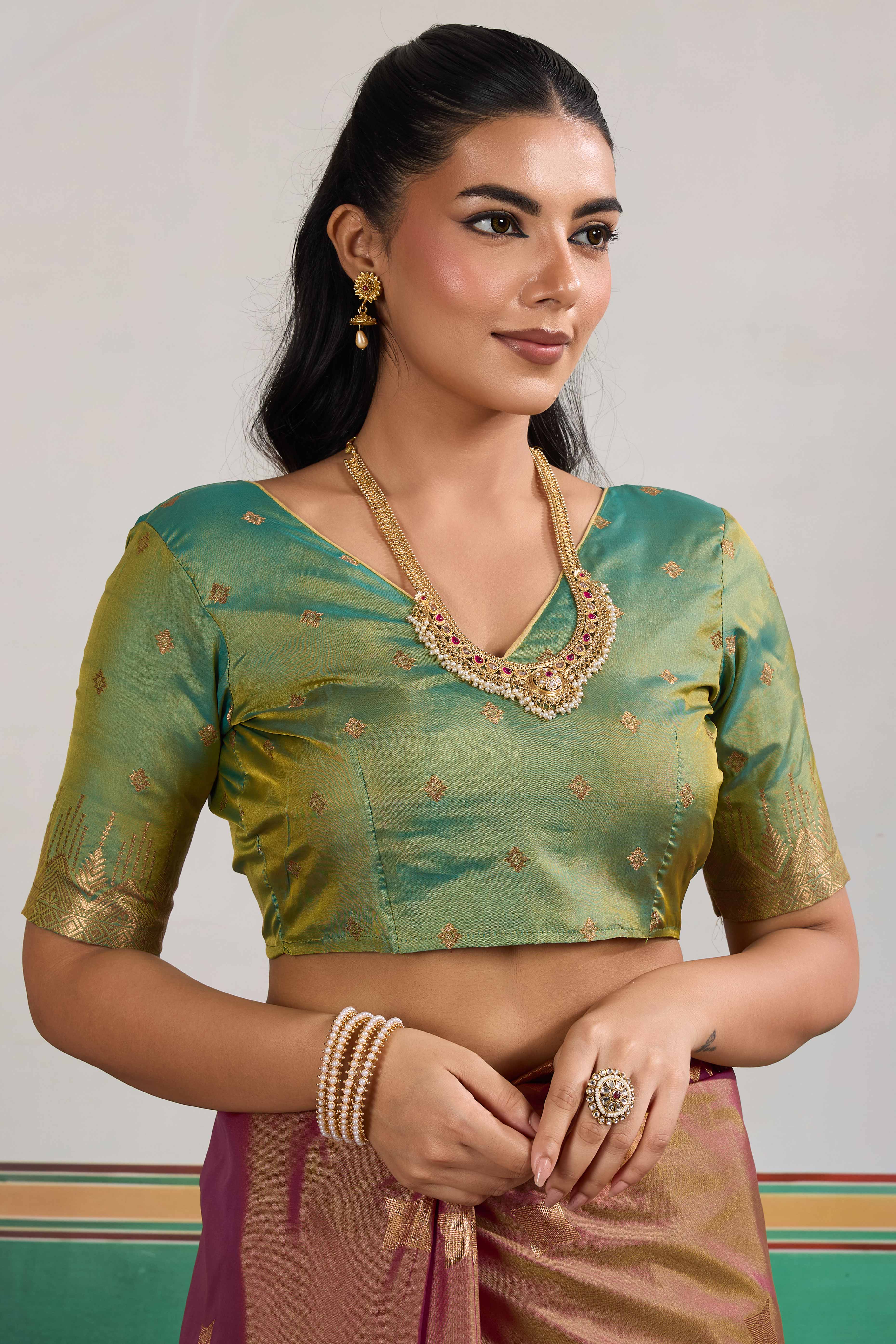 Traditional Brown Pure Silk Saree Featuring Elephant Motif Zari Weaving & Tassel Pallu
