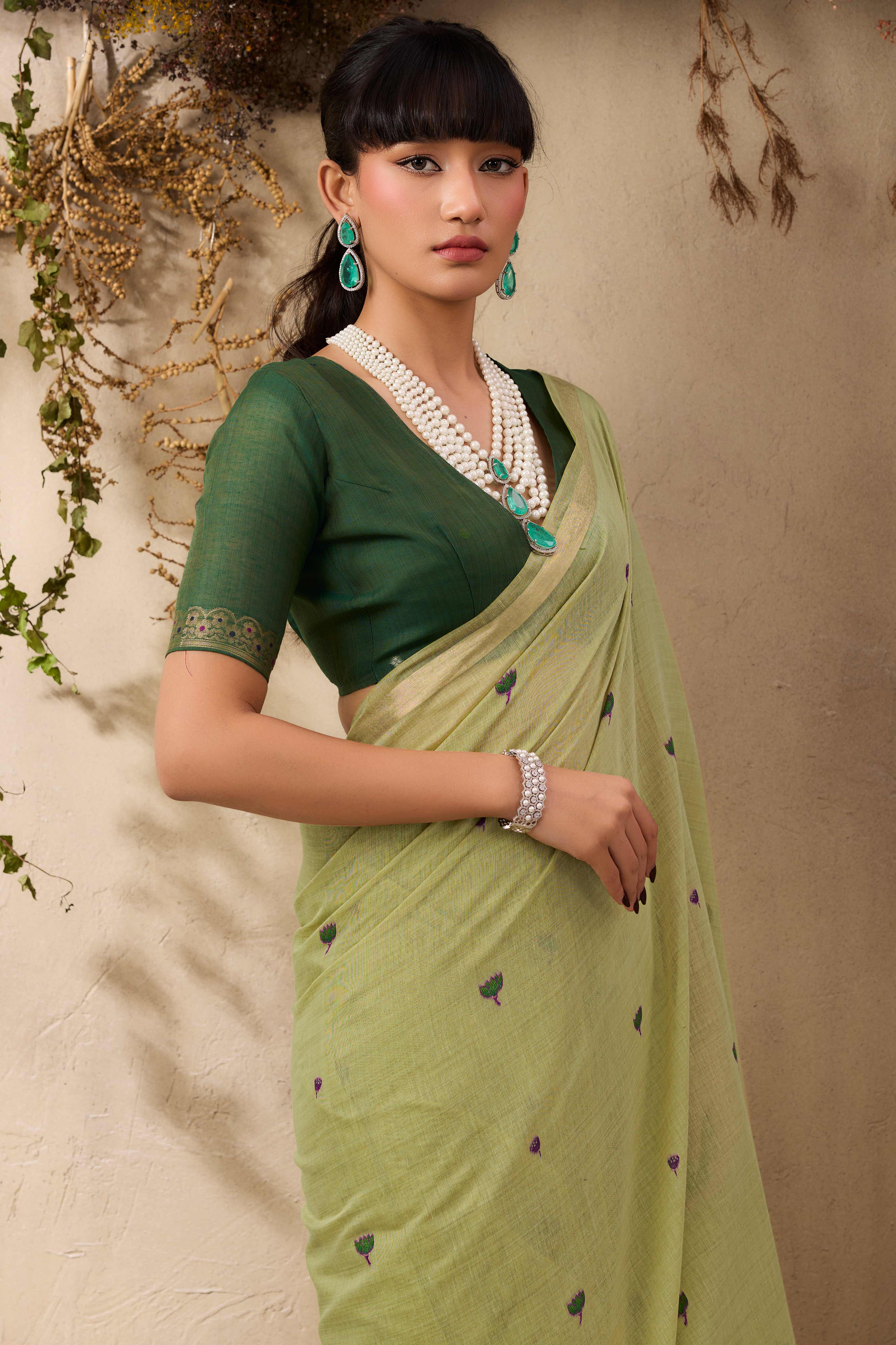 Green Lightweight Handloom Munga Cotton Blend Saree Accented with Floral Woven Motifs