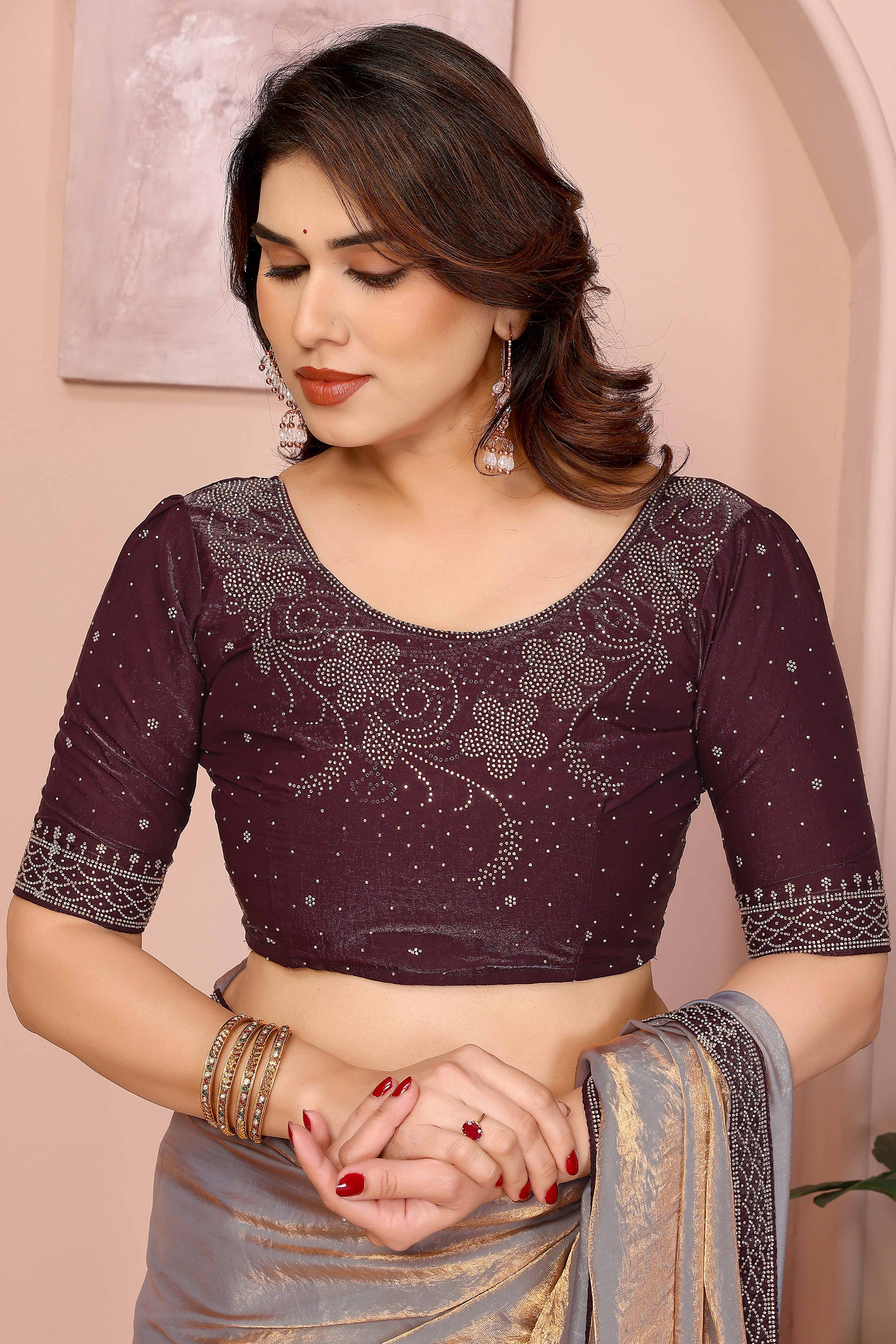 Grey Fancy Satin Saree Featuring a Solid Body and Sparkling Jarkan Work on the Edges