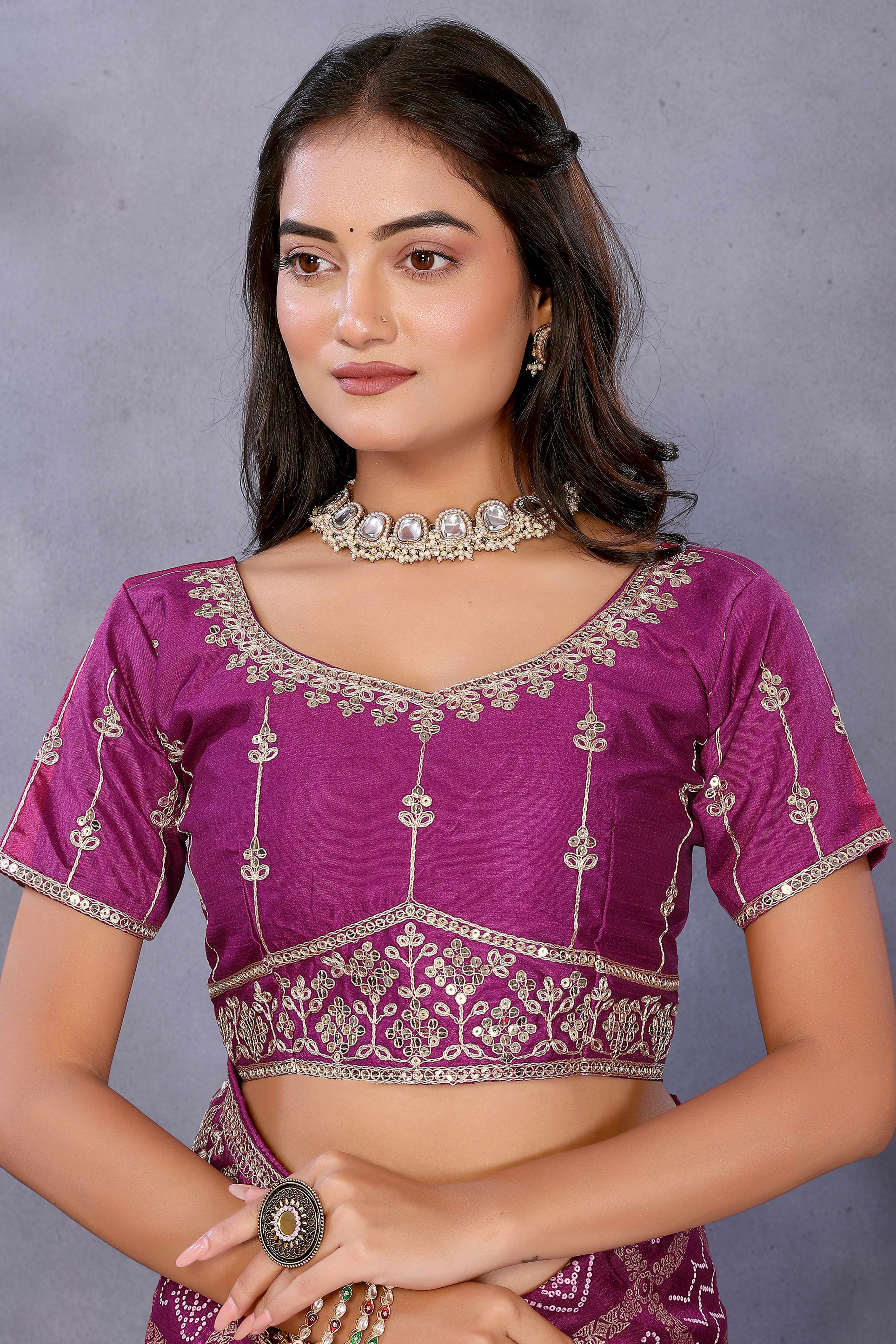 Purple Vichitra Silk Saree Highlighted with Bandhani Print and Sequins Embroidered Border