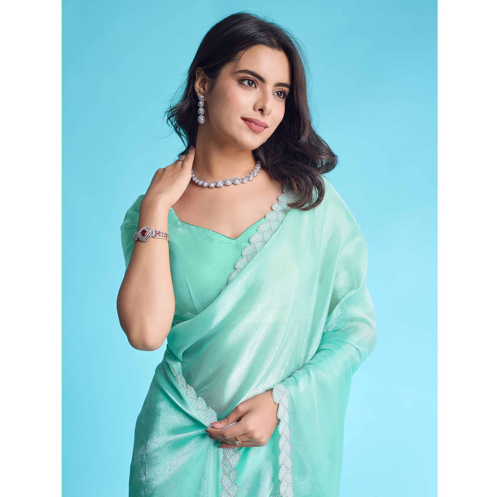 Turquoise Solid With Zarkan & Ceramic Pearl Diamond Lace Tissue Saree