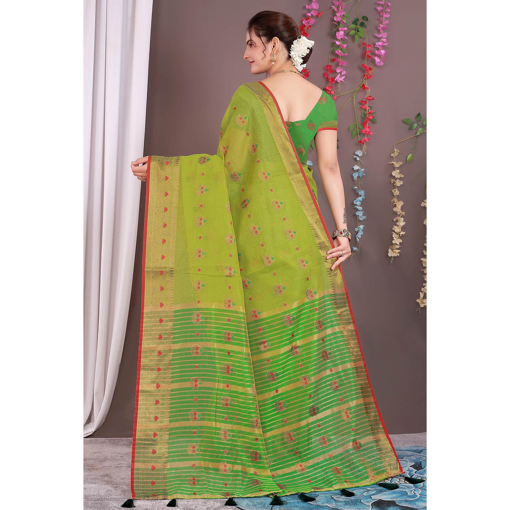 Green Floral Woven Cotton Silk Saree With Tassels