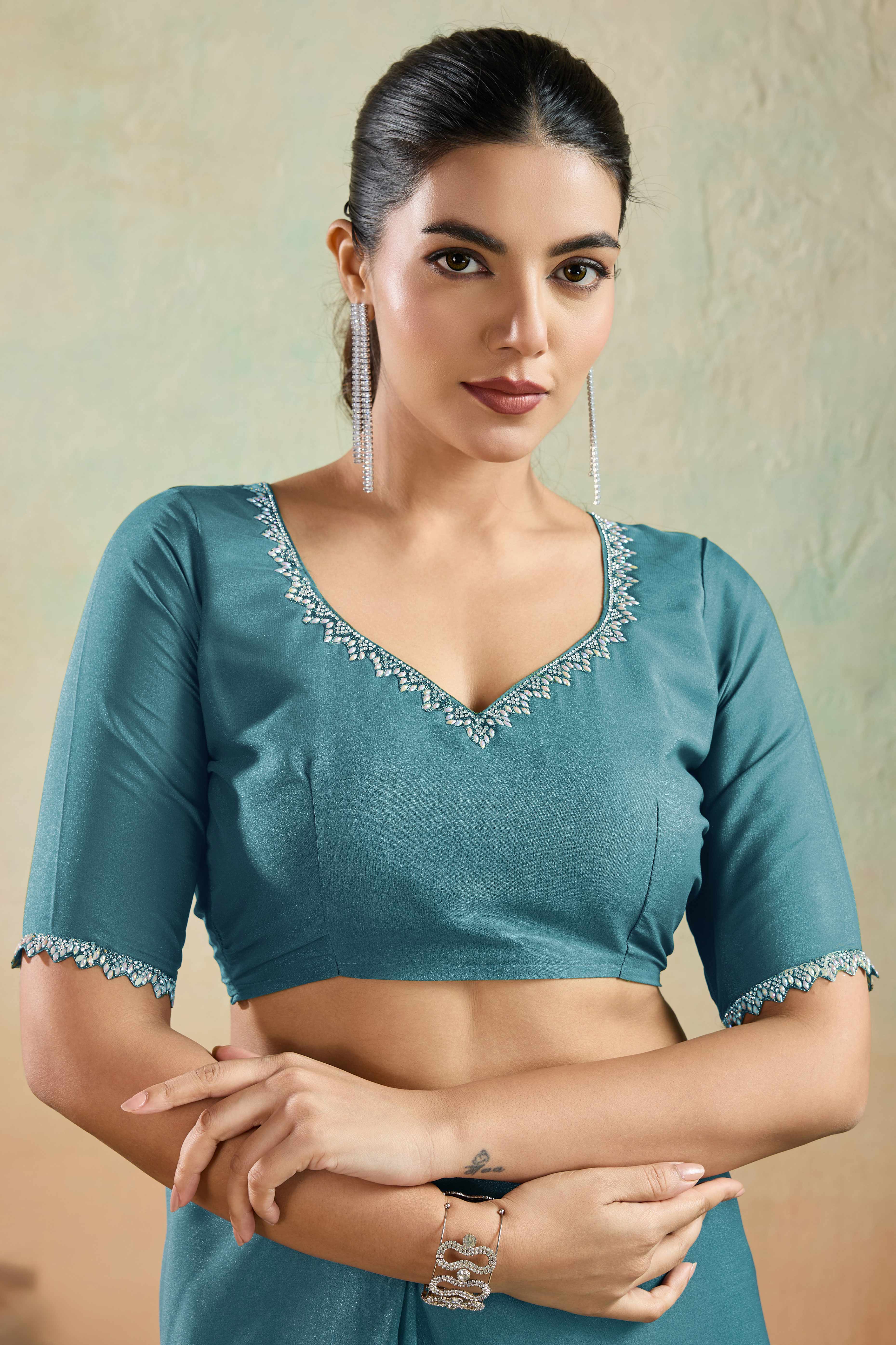 Teal Blue Solid Matt Georgette Saree With Ceramic Embellished Lace Border