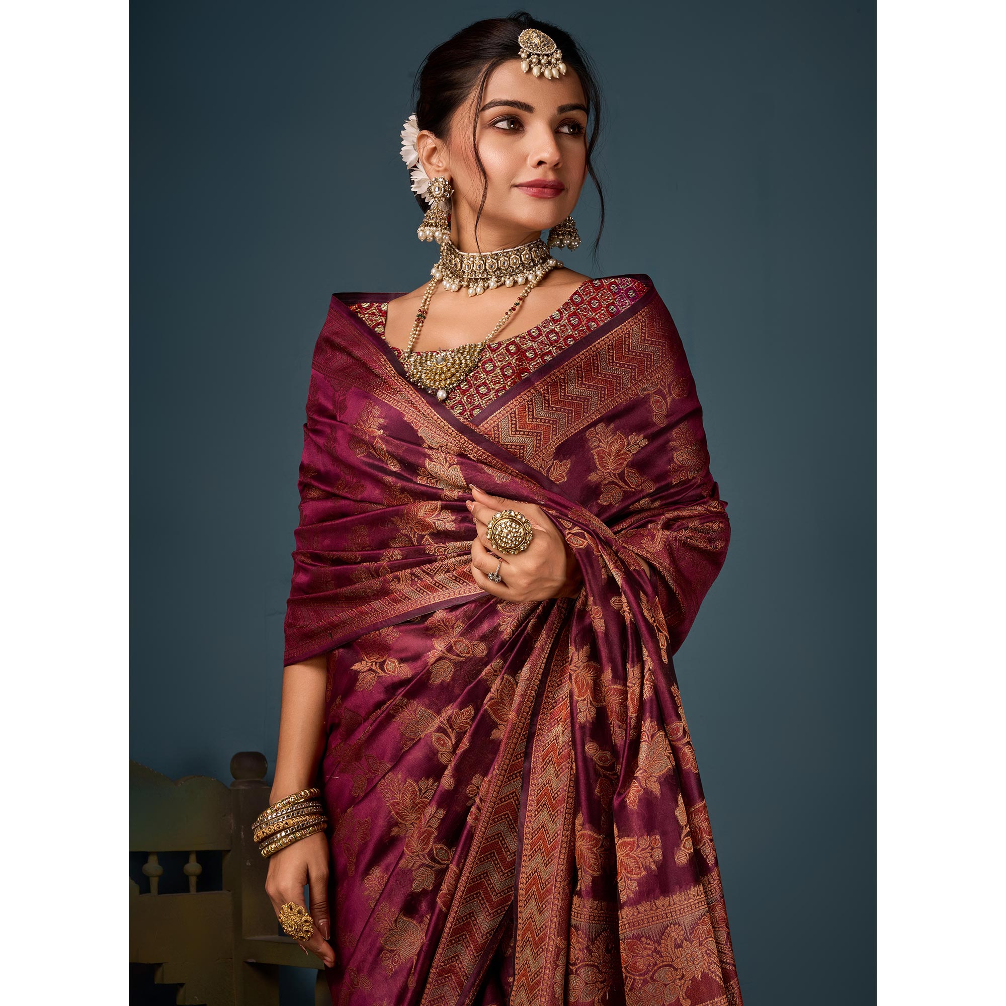 Wine Floral Woven Organza Saree With Tassels