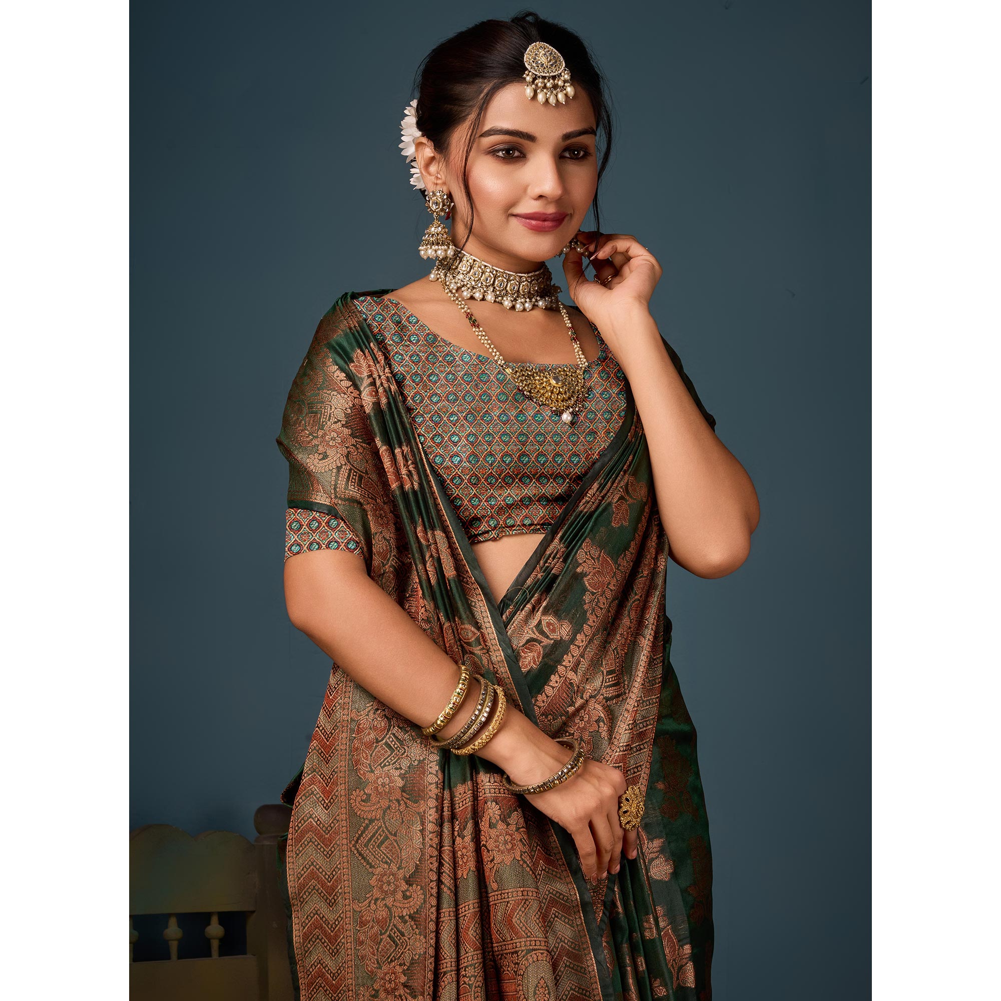 Bottle Green Floral Woven Organza Saree With Tassels