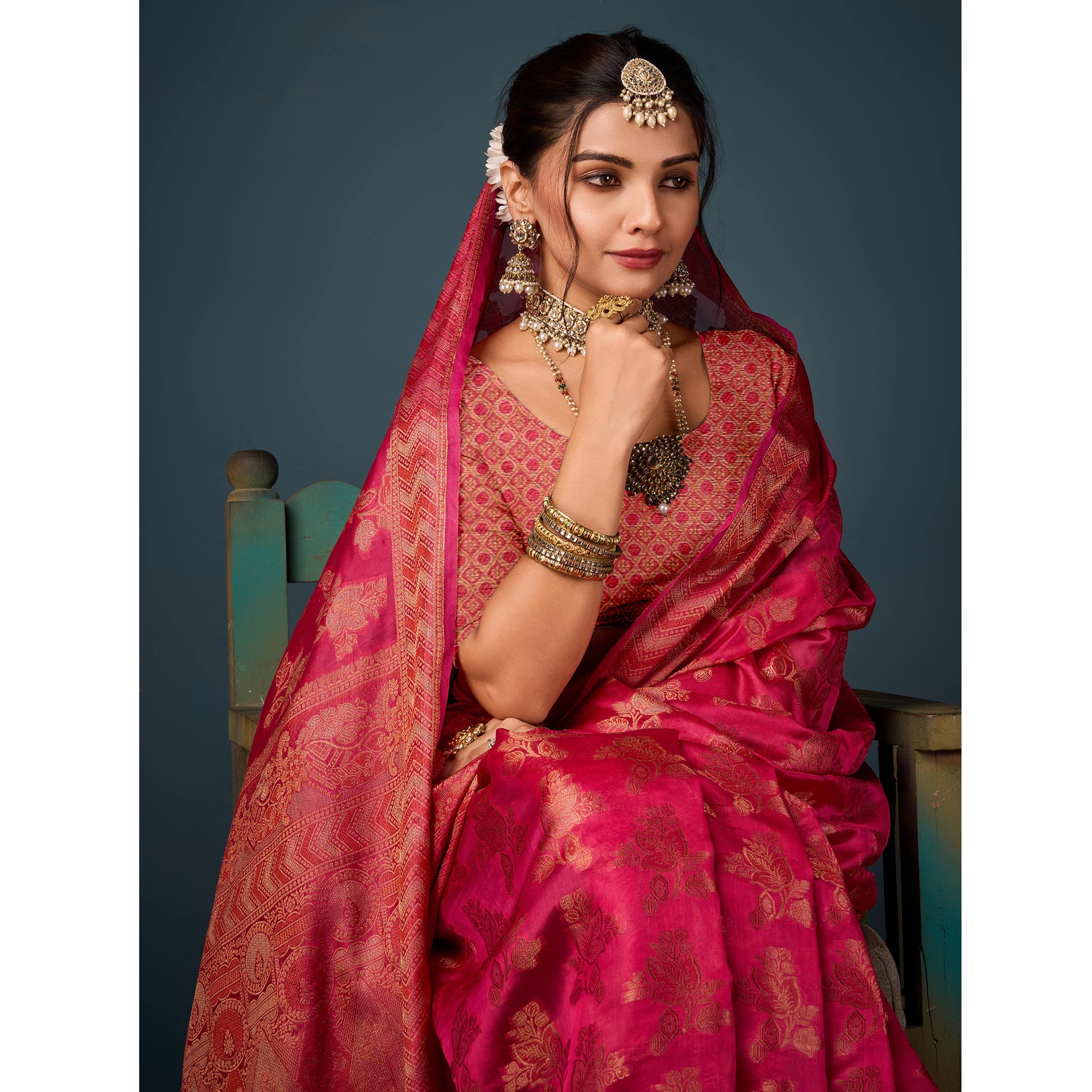 Rani Pink Floral Woven Organza Saree With Tassels