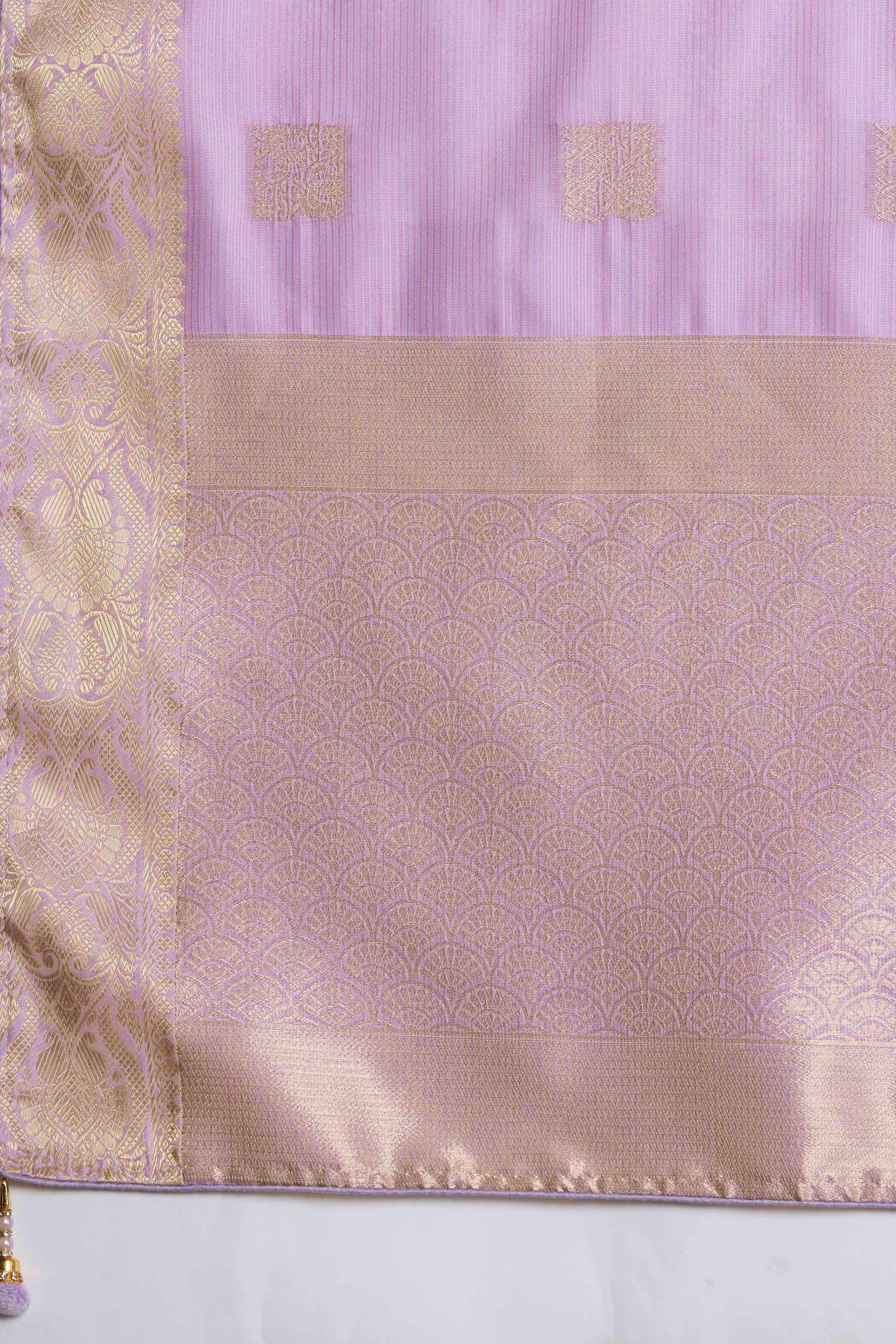 Contemporary Lavender Silk Blend Saree Flaunting Alternate Buttas With Piping & Tassel Accents