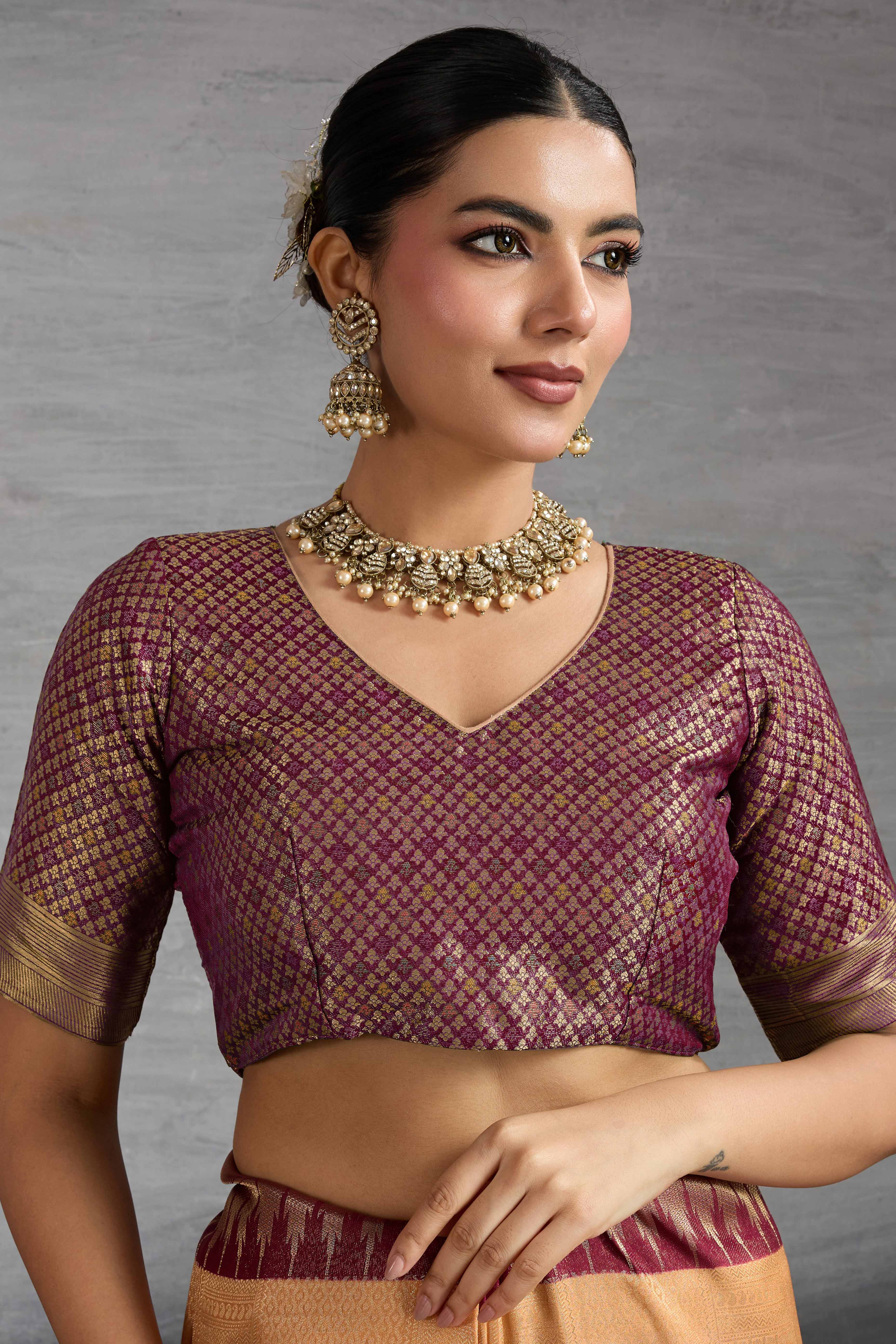 Light Orange Silk Kanjivaram Saree Enhanced With Kadiyal Weaving Borders