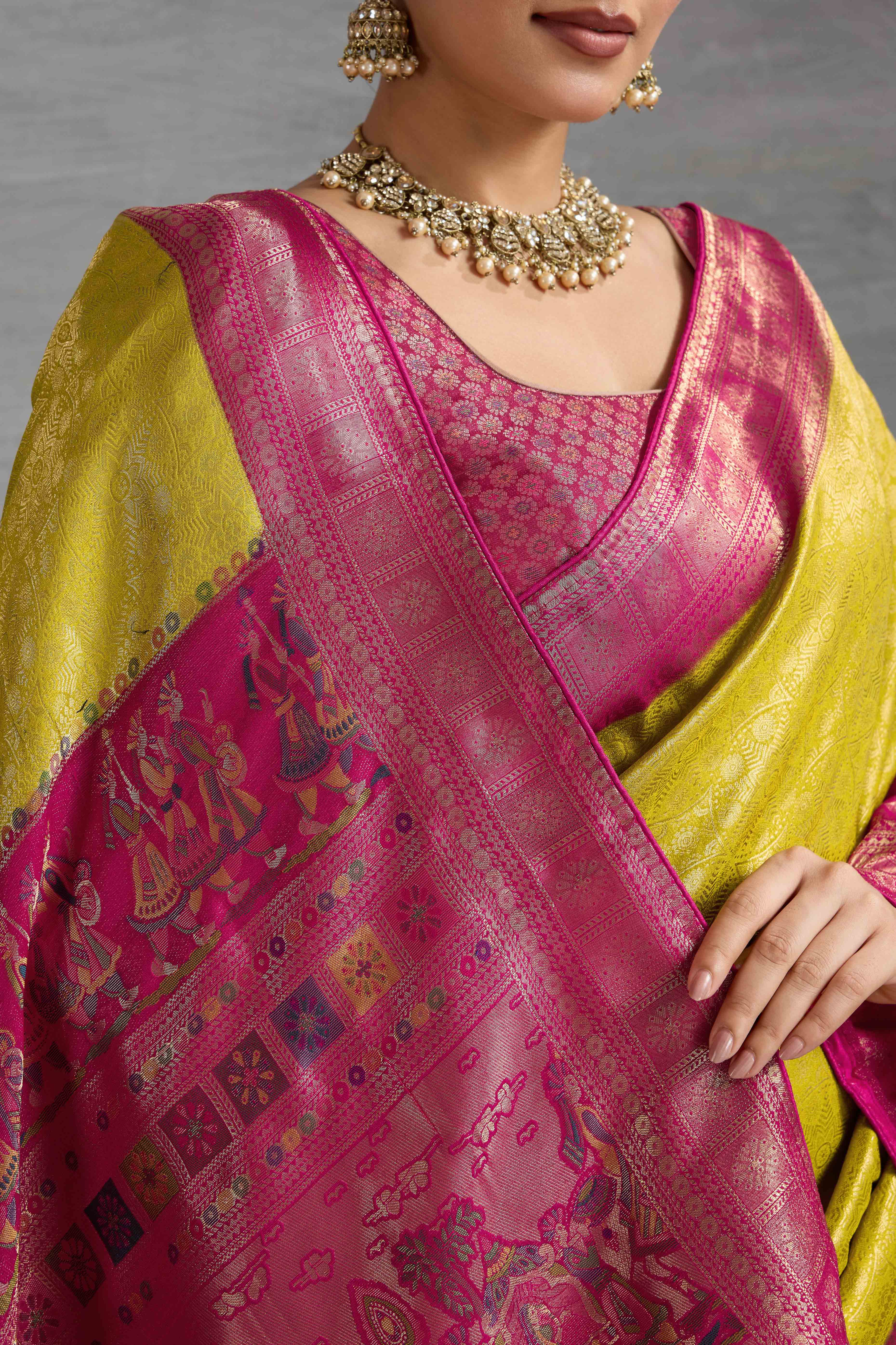 Lime Yellow Silk Kanjivaram Silk Saree Enhanced With Meenakari Weaving Borders