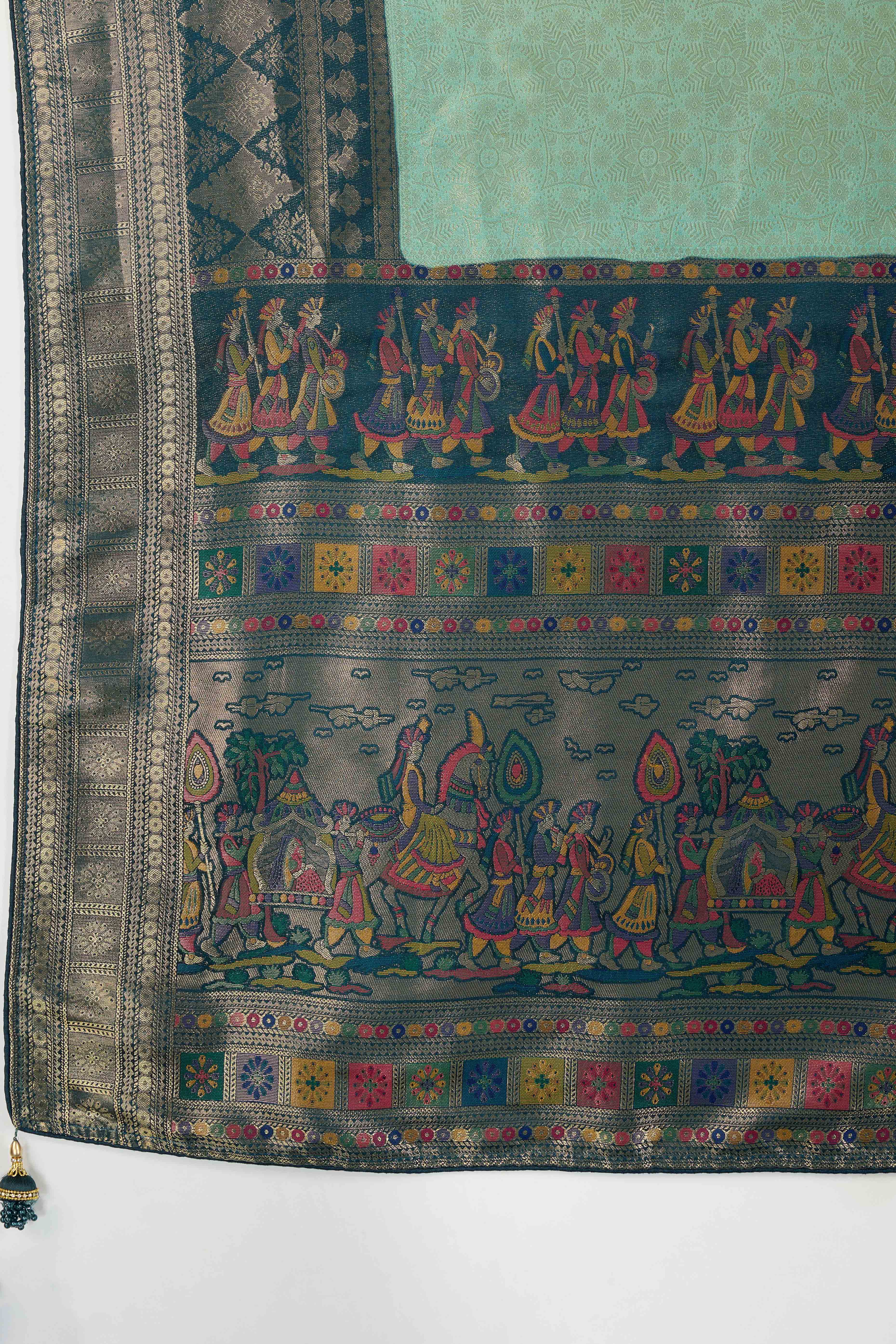 Sea Green Silk Kanjivaram Silk Saree Enhanced With Meenakari Weaving Borders