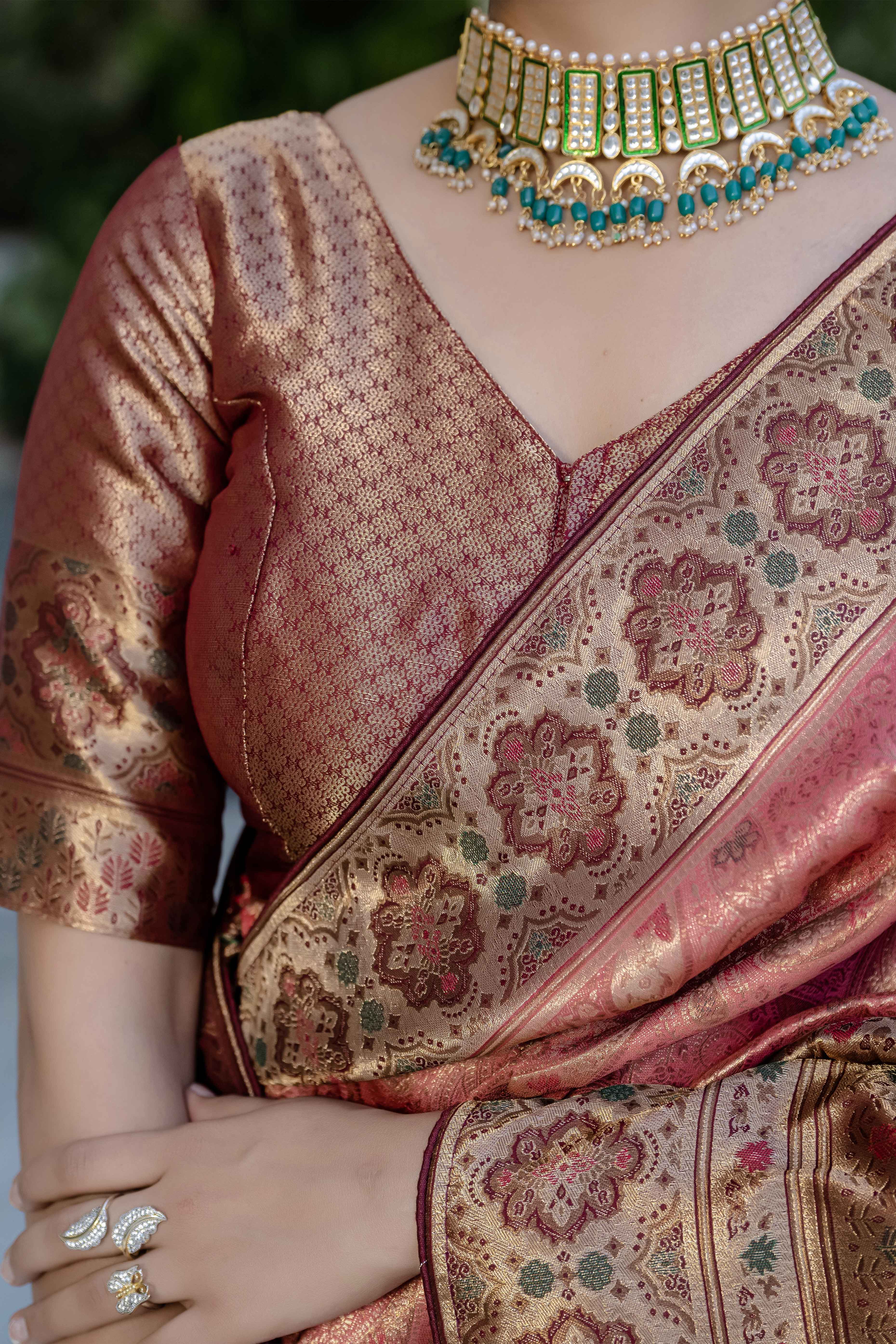 Gajari Pink Kanjivaram Silk Saree Showcasing Floral Meenakari Zari Weaving With Piping & Tassels