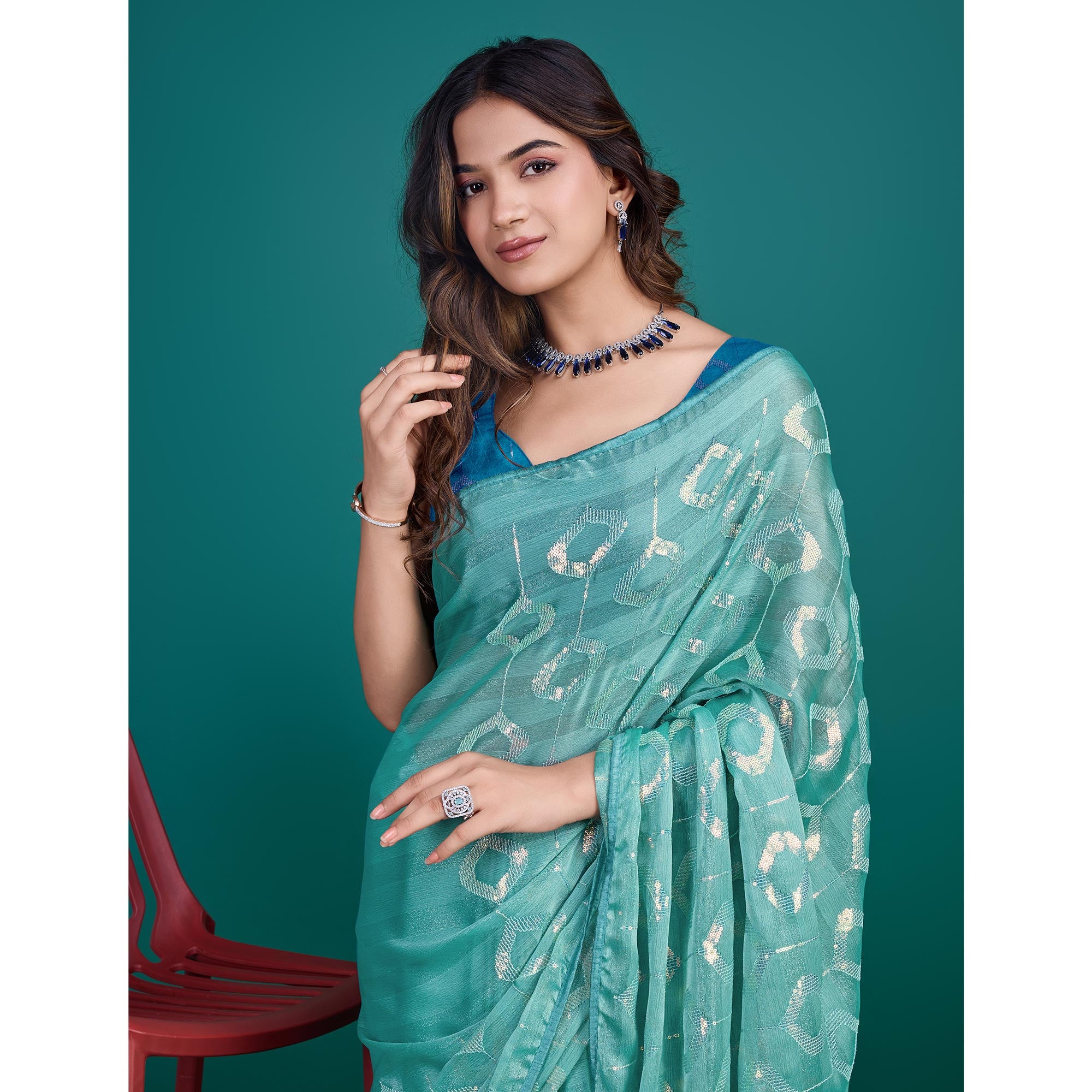 Turquoise Sequin Embroidered Georgette Saree