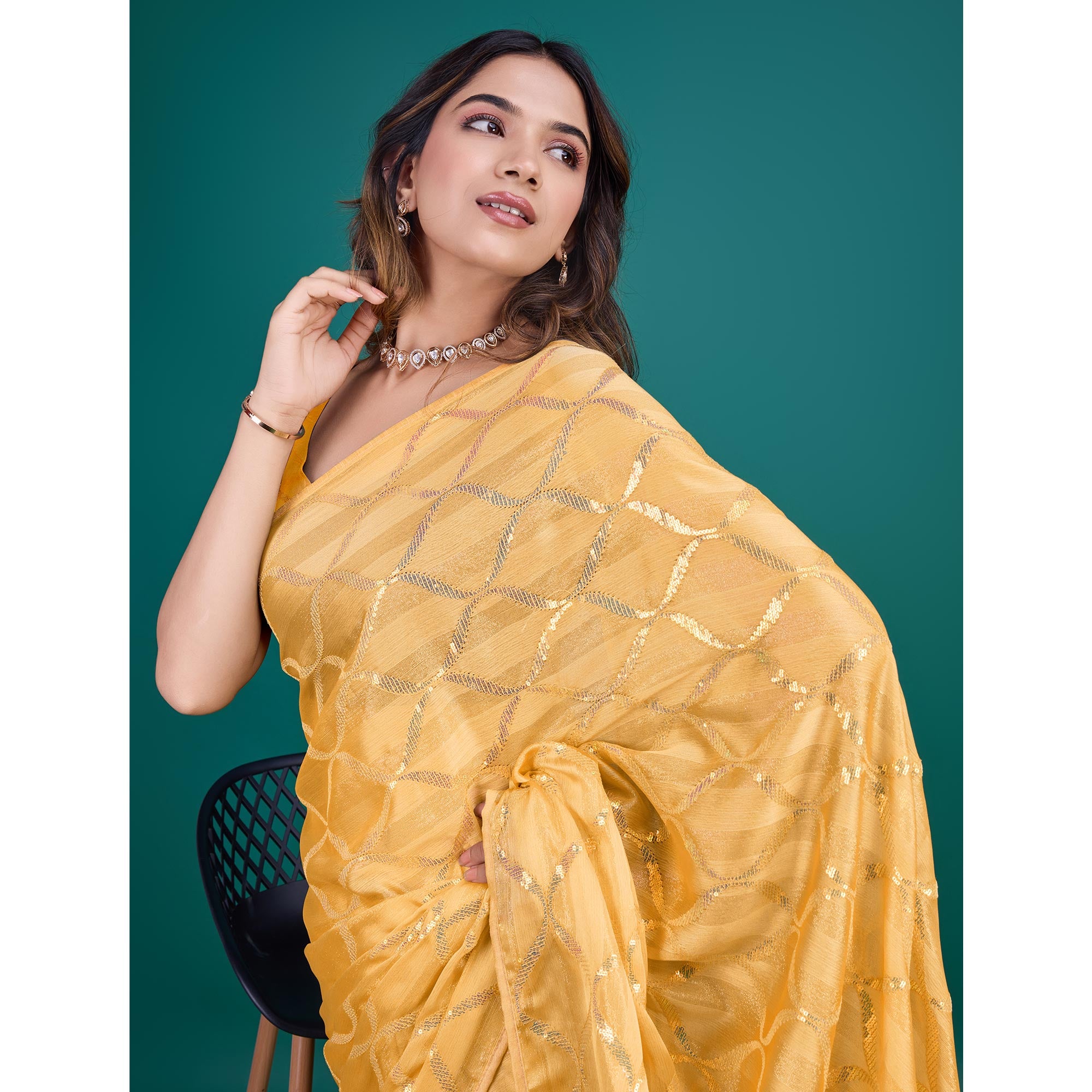 Yellow Sequins Embroidered Georgette Saree