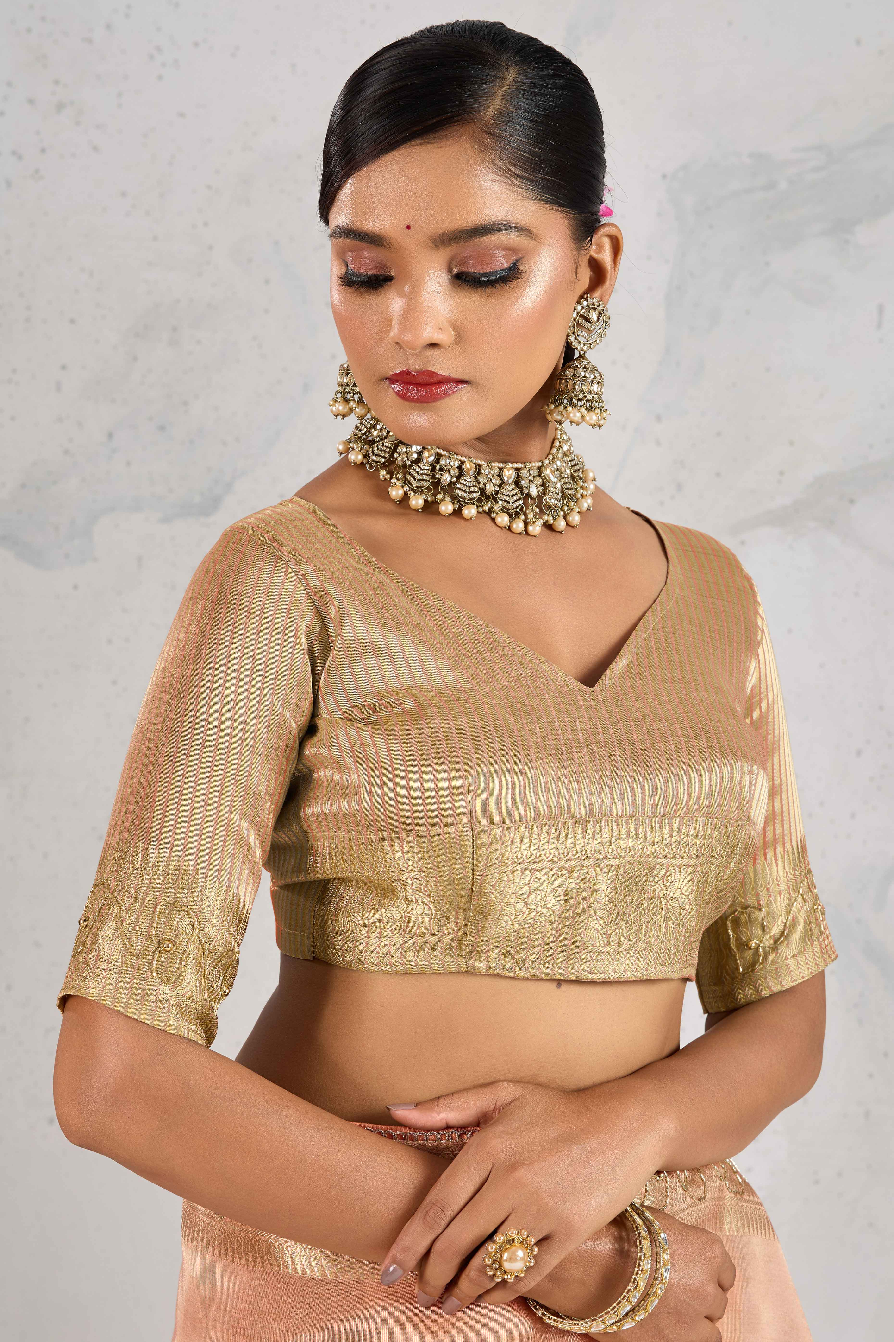 Peach Tissue Linen Saree Adorned With Intricate Zardosi & Pearl Cutdana Hand Embroidery