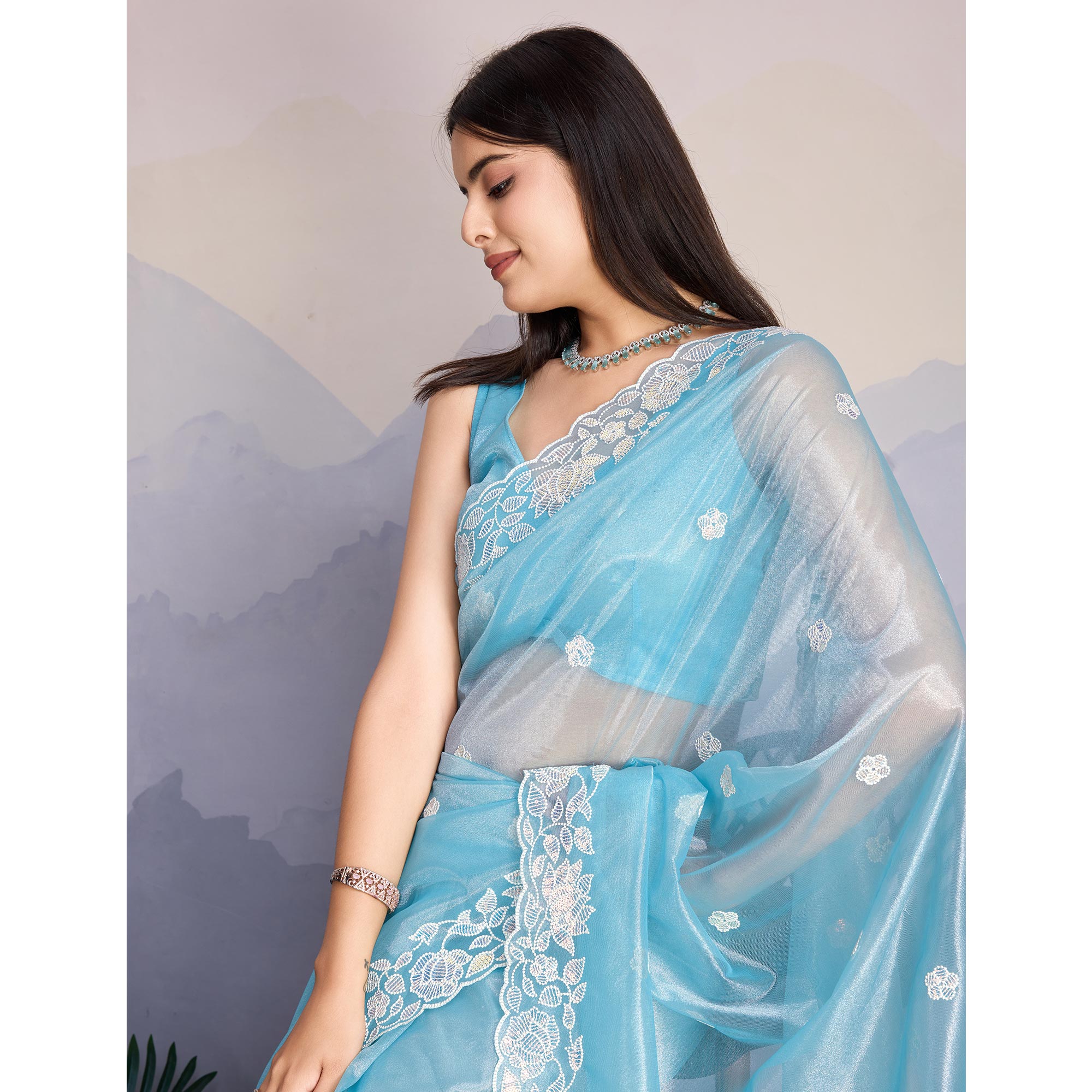 Blue Floral Sequins Embroidered Twill Net Saree