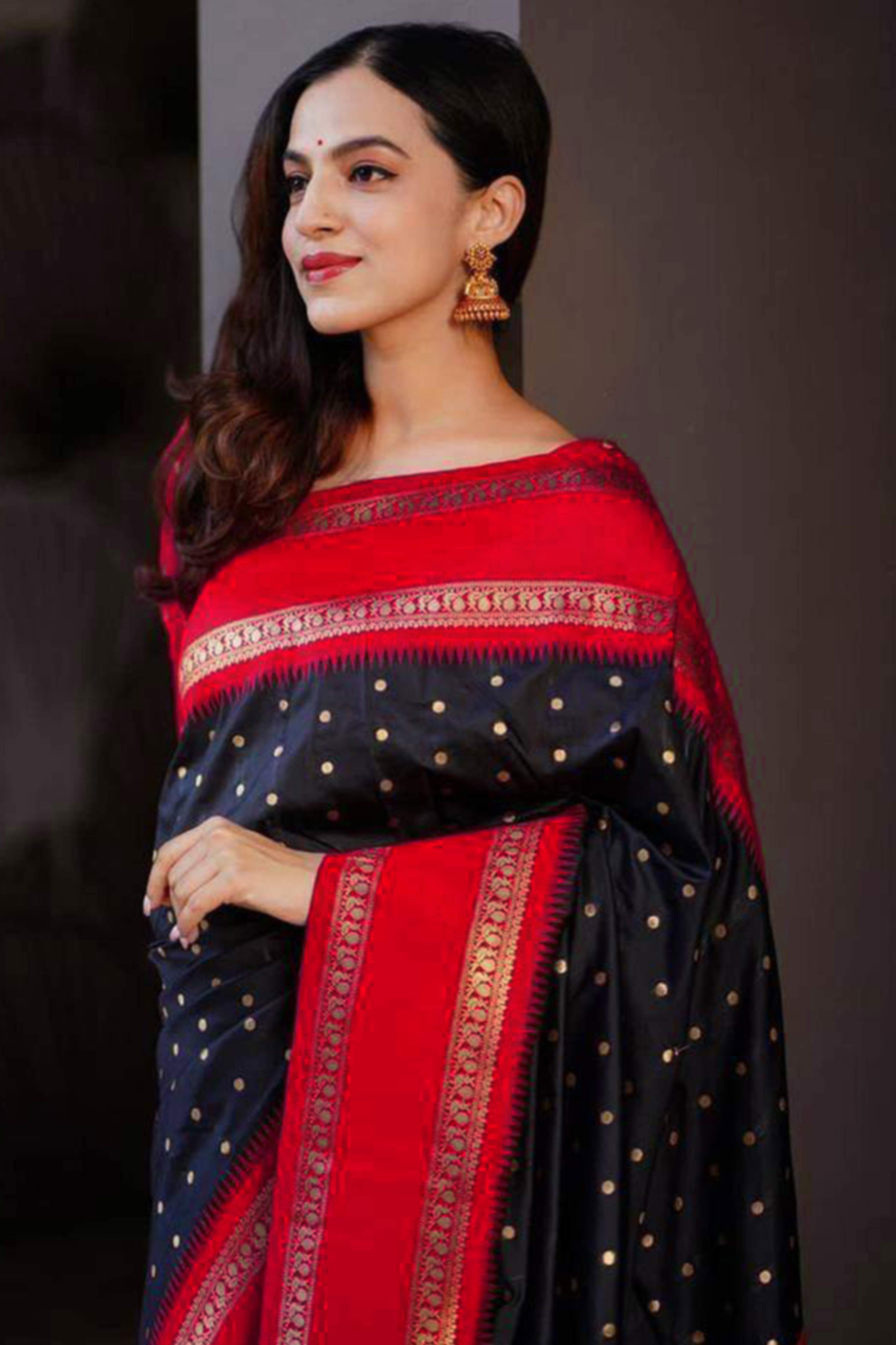 Striking Black & Red Zari Woven Lichi Banarasi Silk Saree With Tassel Accents