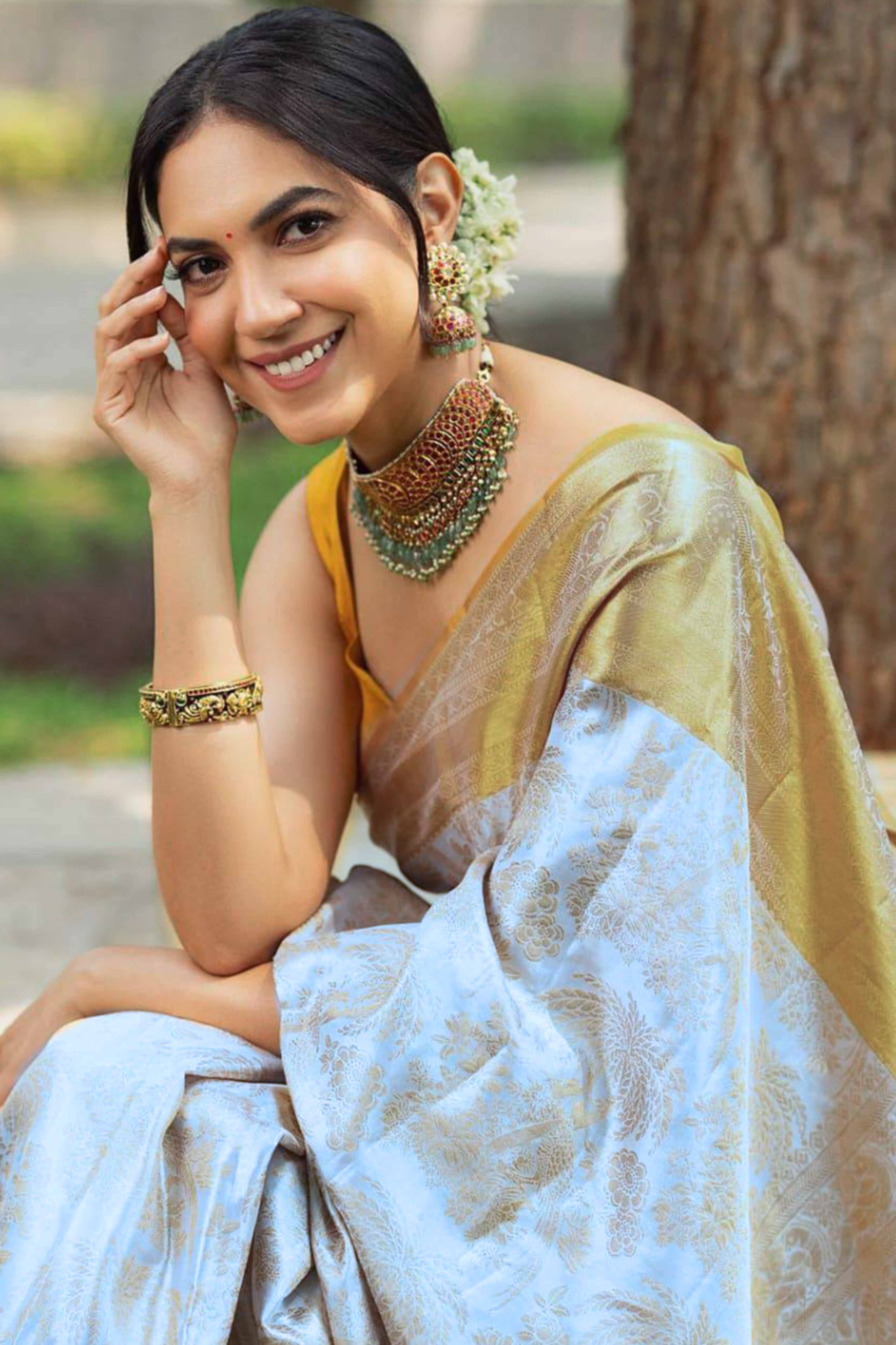 Charming White & Yellow Floral Zari Woven Lichi Banarasi Silk Saree