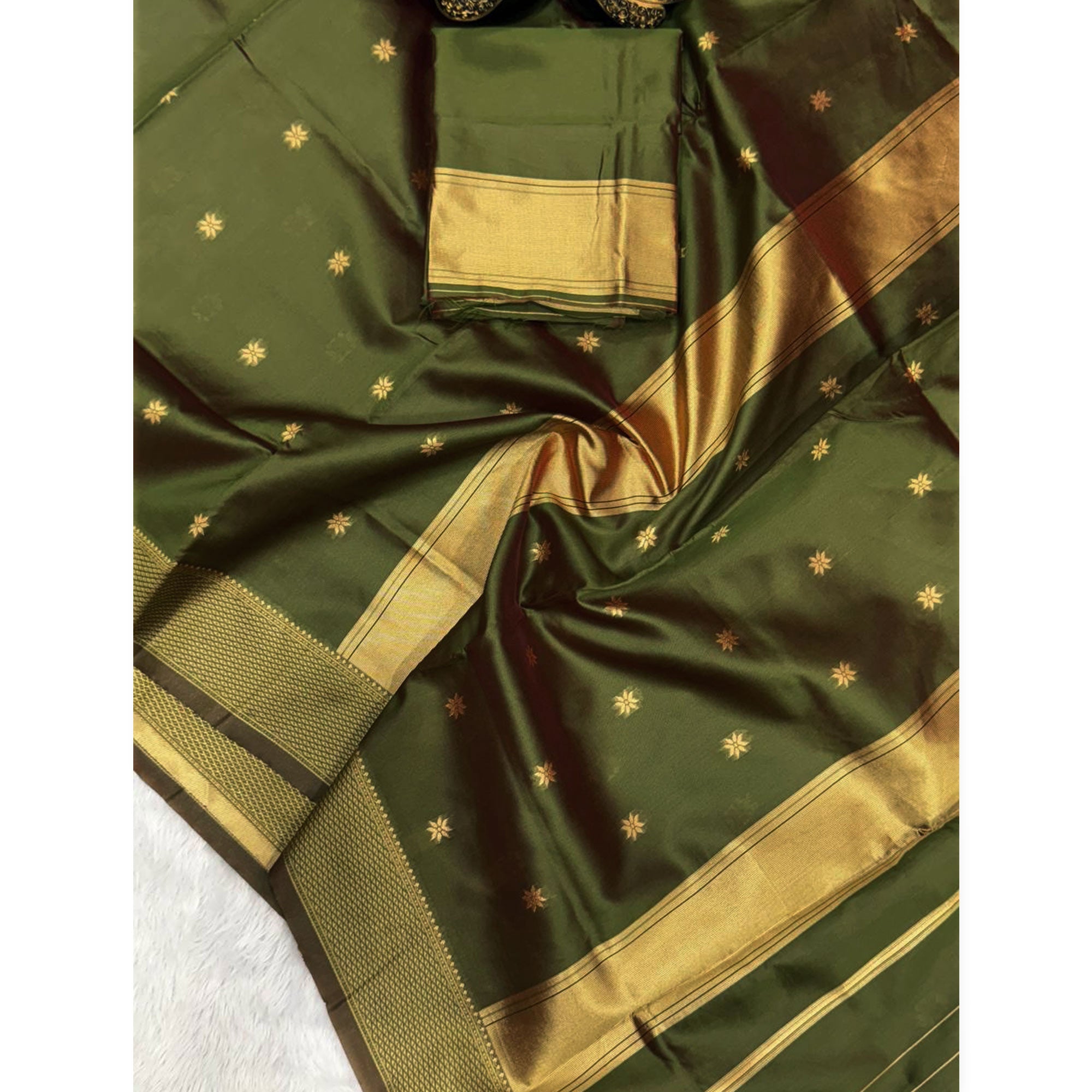 Exquisite Mehendi Green Floral Zari Woven Lichi Banarasi Silk Saree