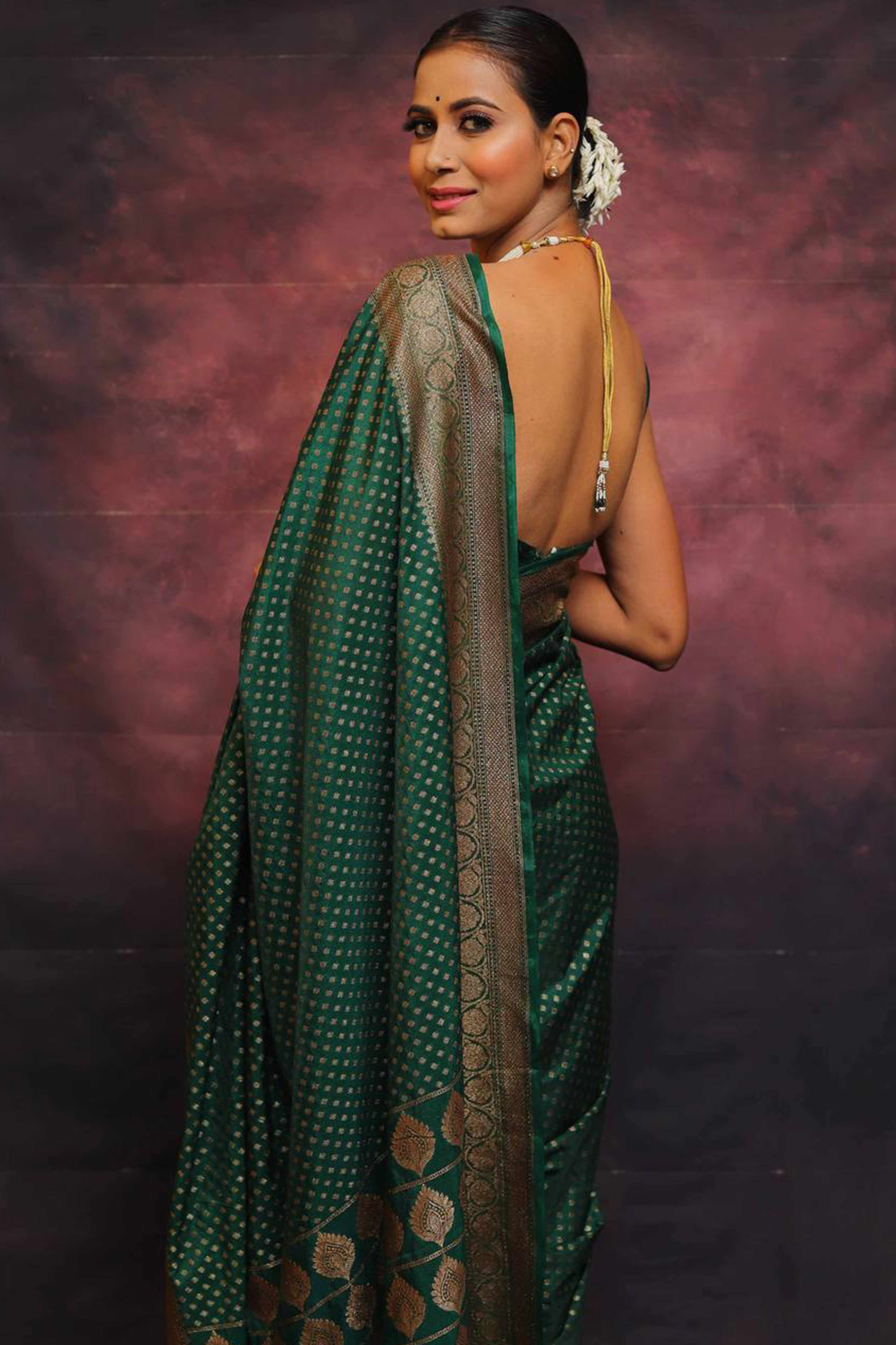 Bottle Green Floral Woven Lichi Banarasi Silk Saree