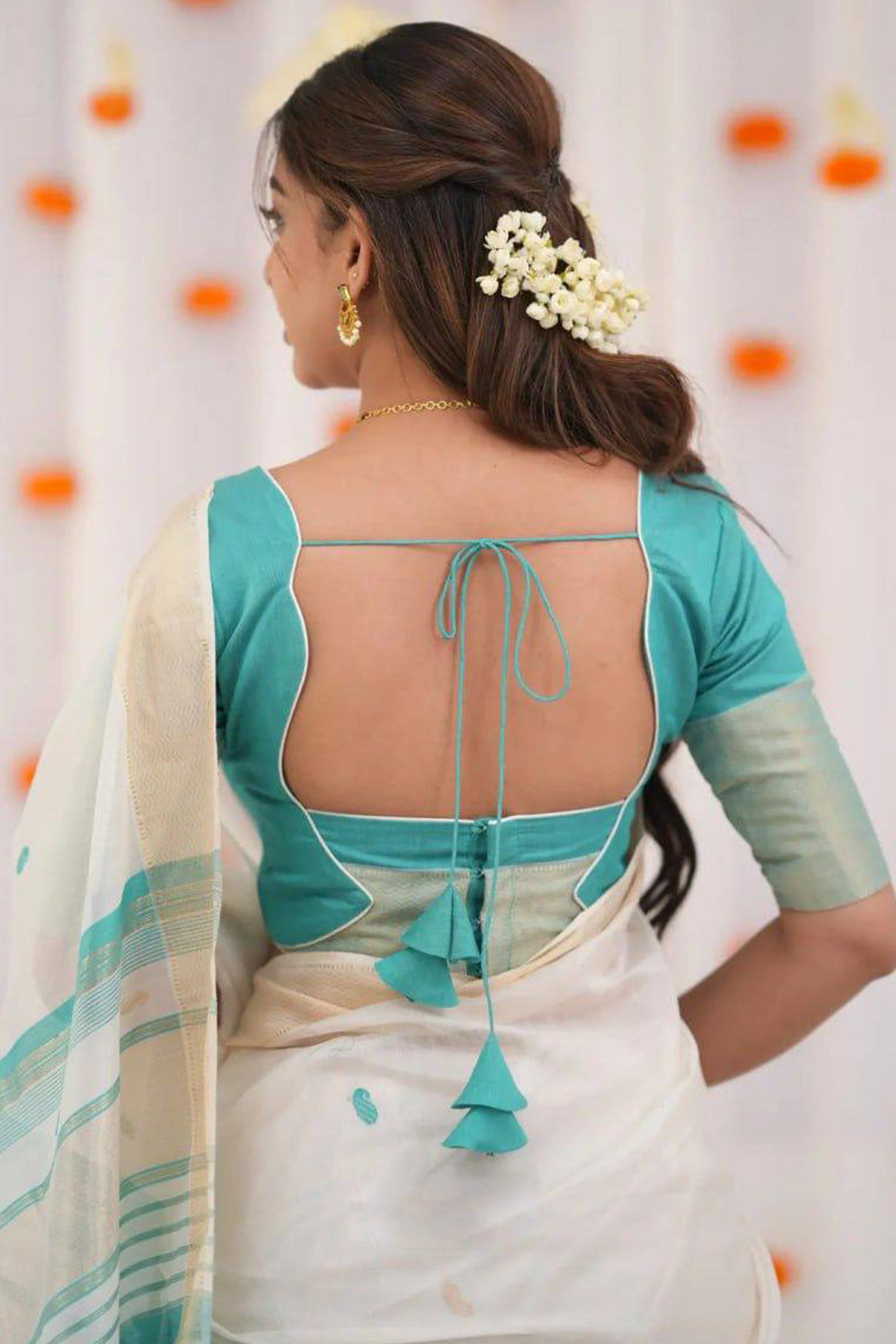 White and Turquoise Zari-Woven Linen Cotton Saree Offering a Refined Festive Look