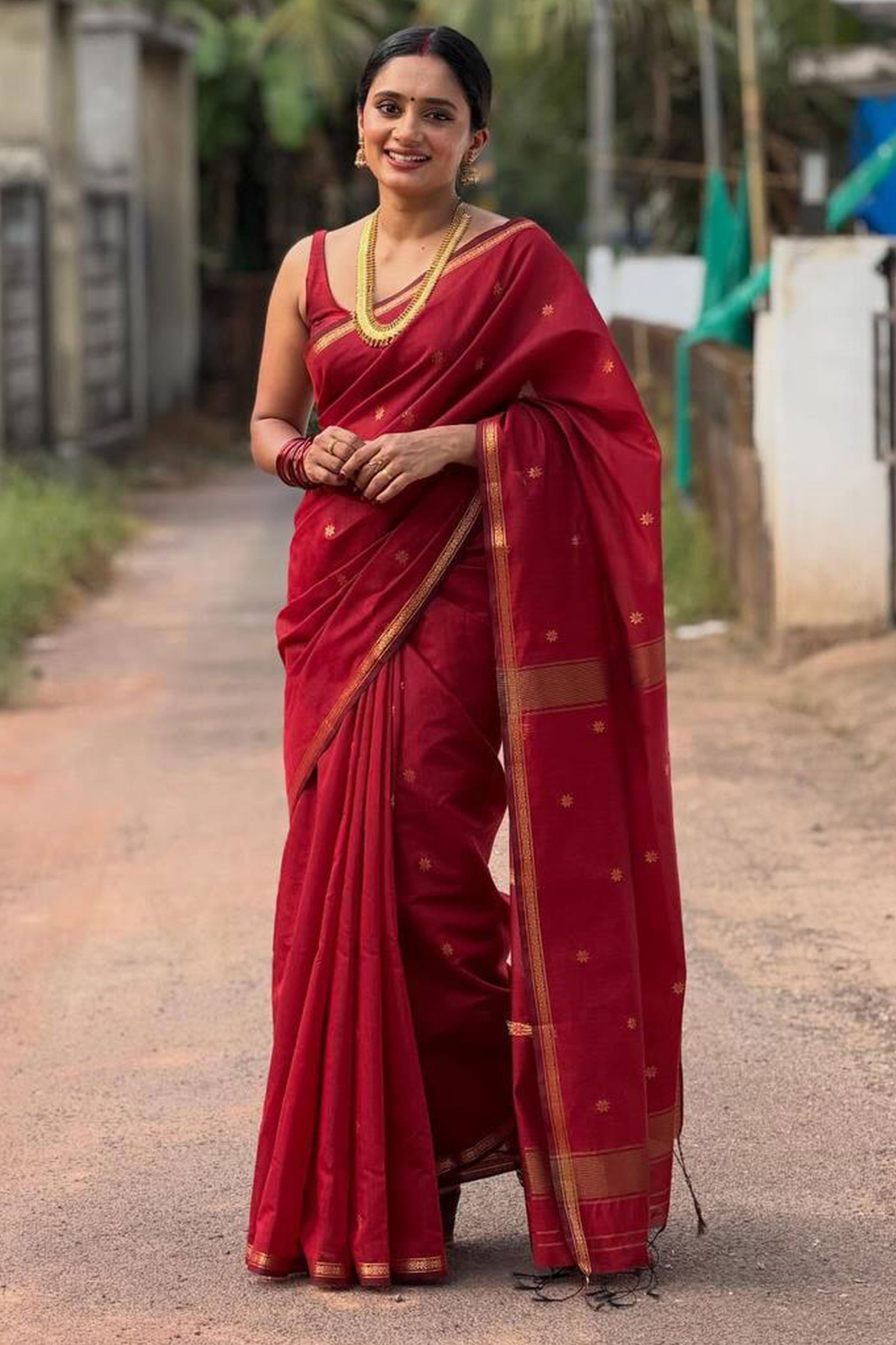 Maroon Classic Linen Cotton Saree Enhanced with Fine Zari Butti Weaving Detailing