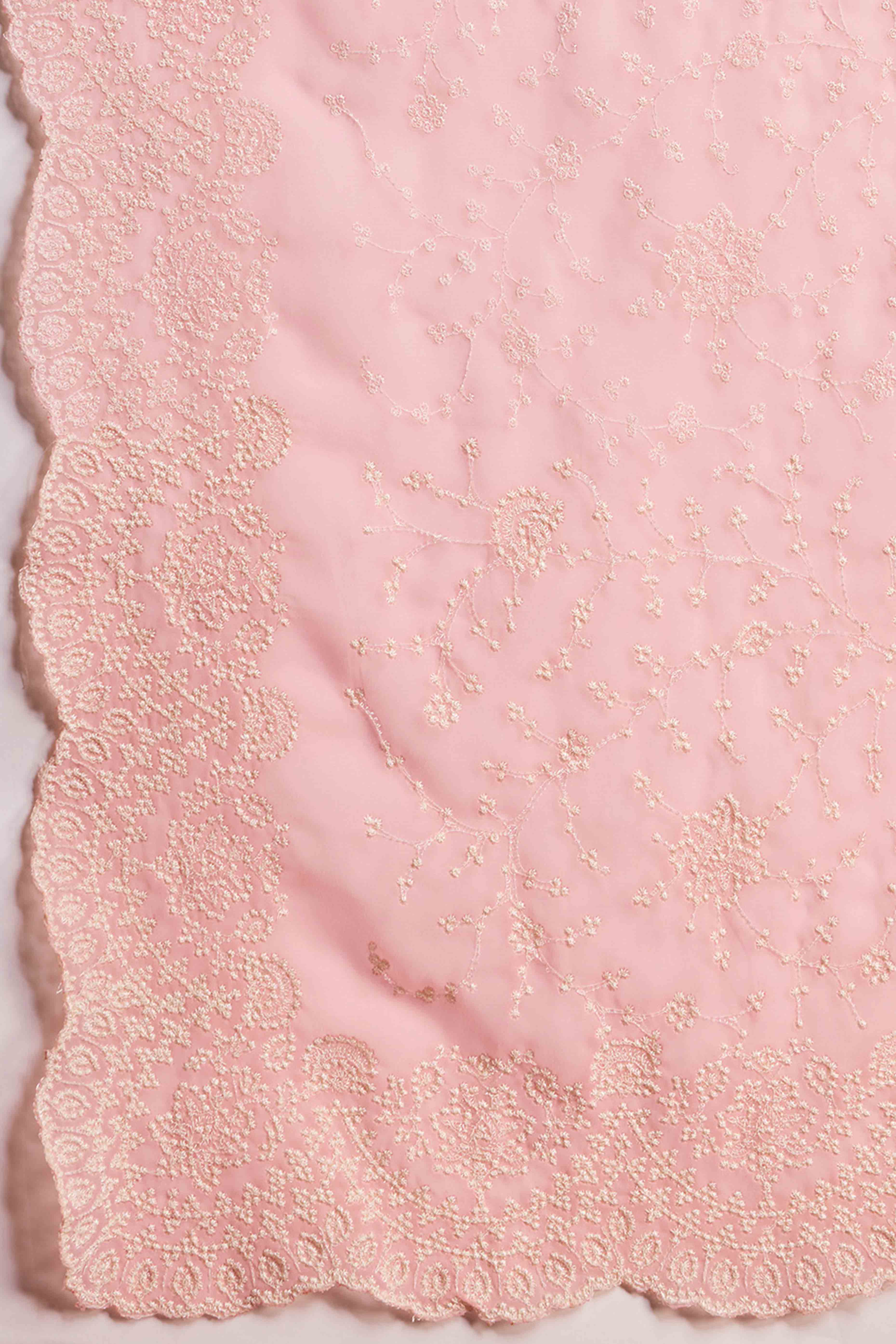 Soft Pastel Pink Embroidered Georgette Saree Featuring Thread Detailing