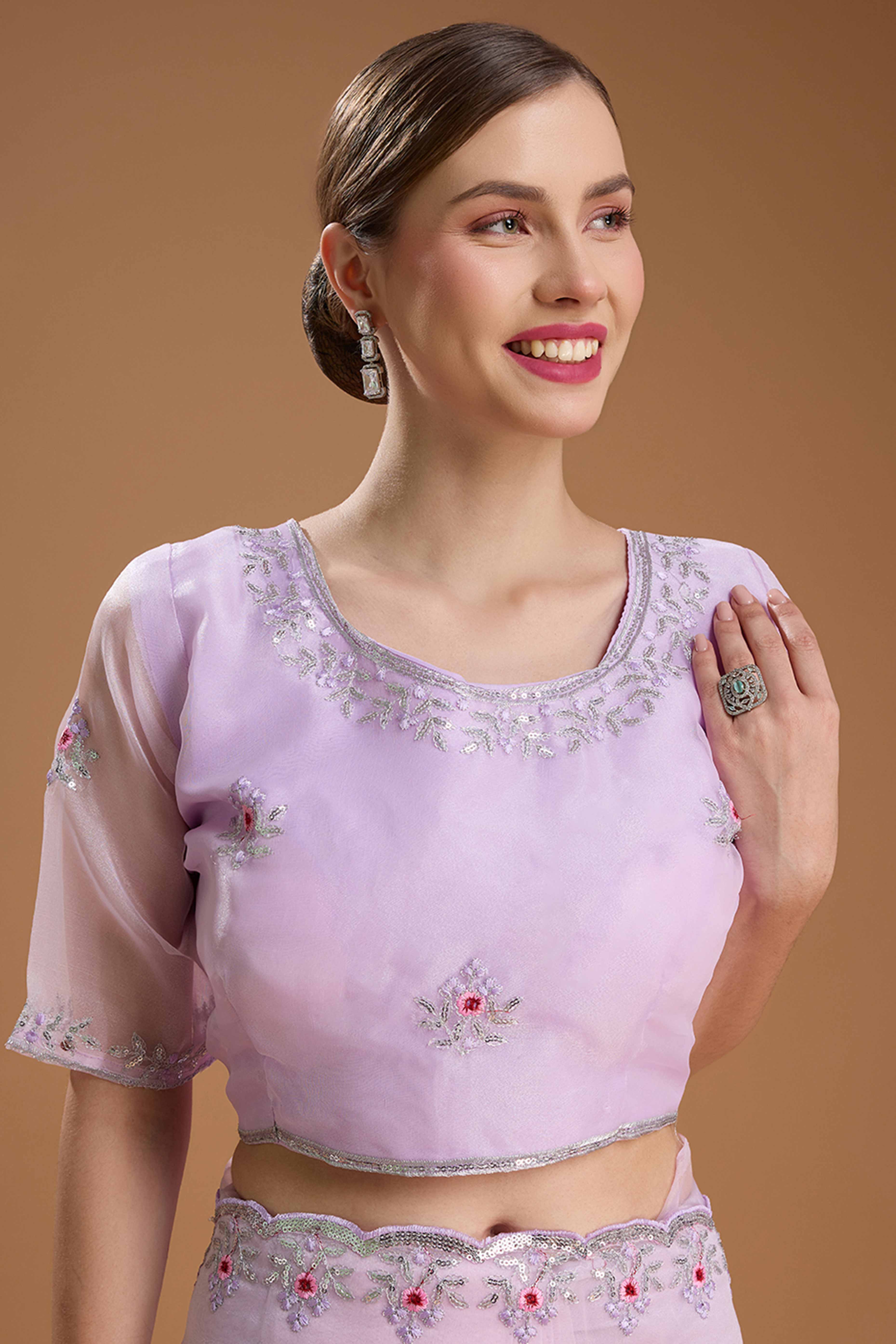 Light Lavender Net Saree Enhanced with Elegant Sequins Embellishments