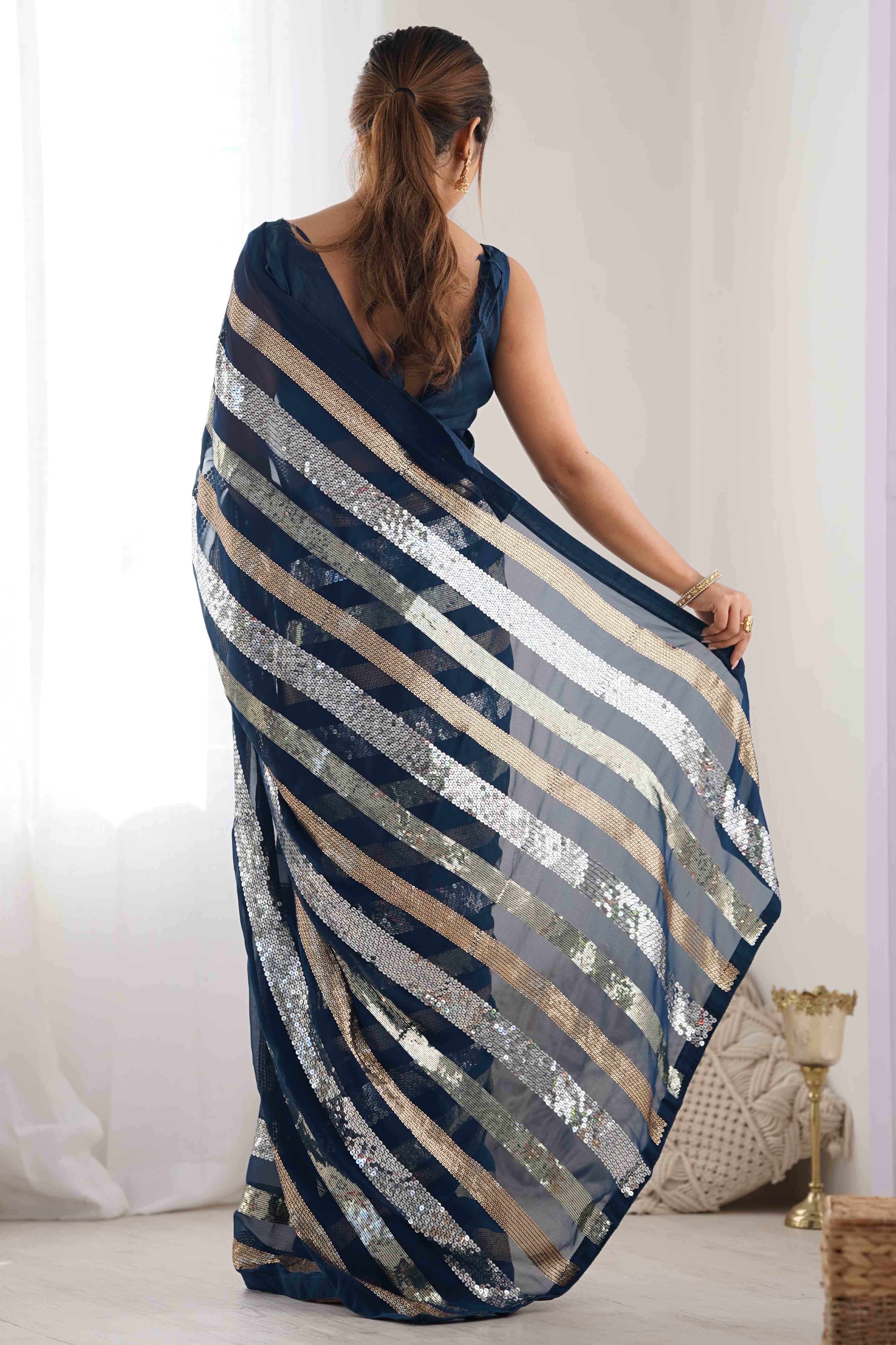 Teal Sequins Embroidered Georgette Saree