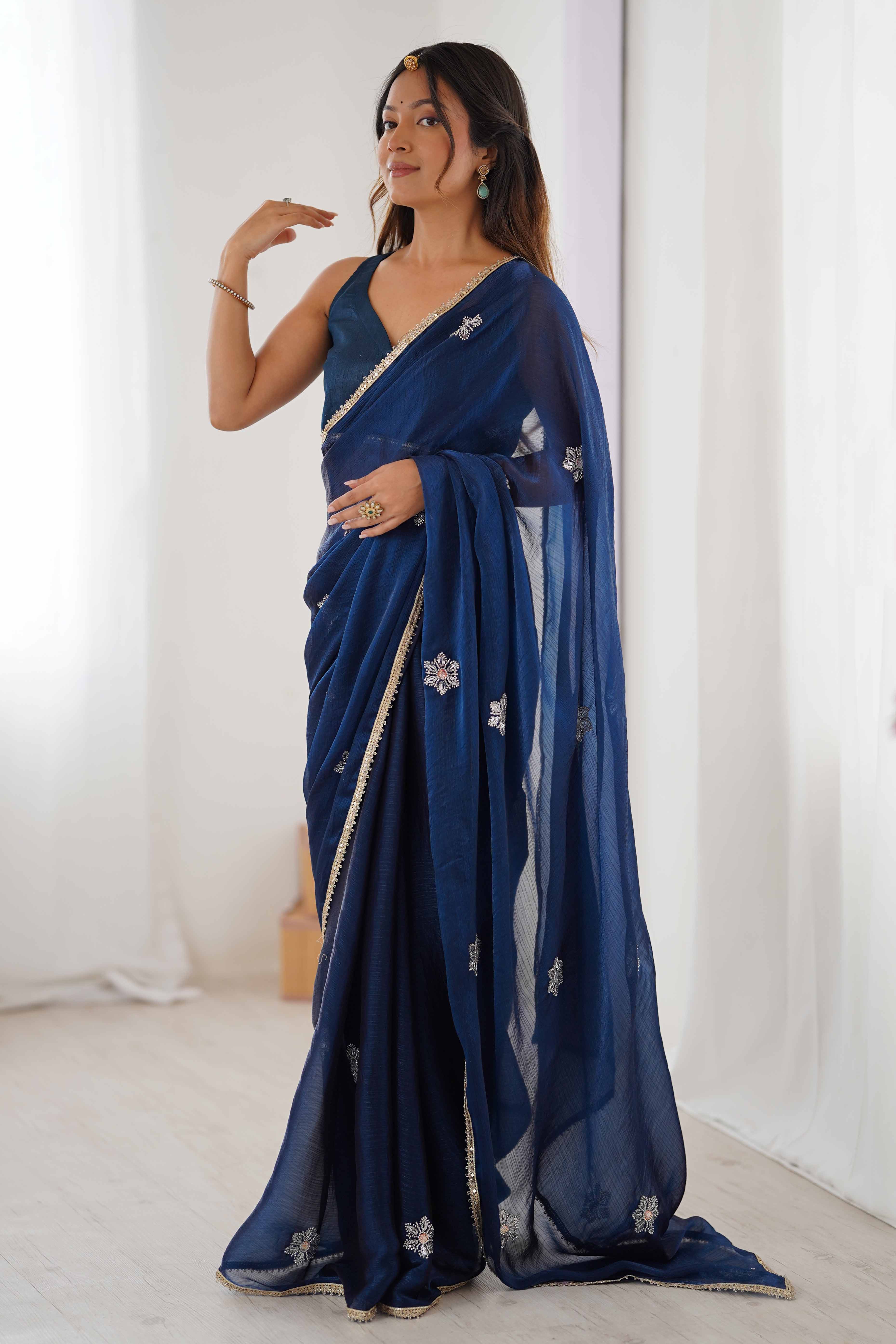 Blue Organza Saree Embellished with Intricate Floral Work and Elegant Lace Detailing