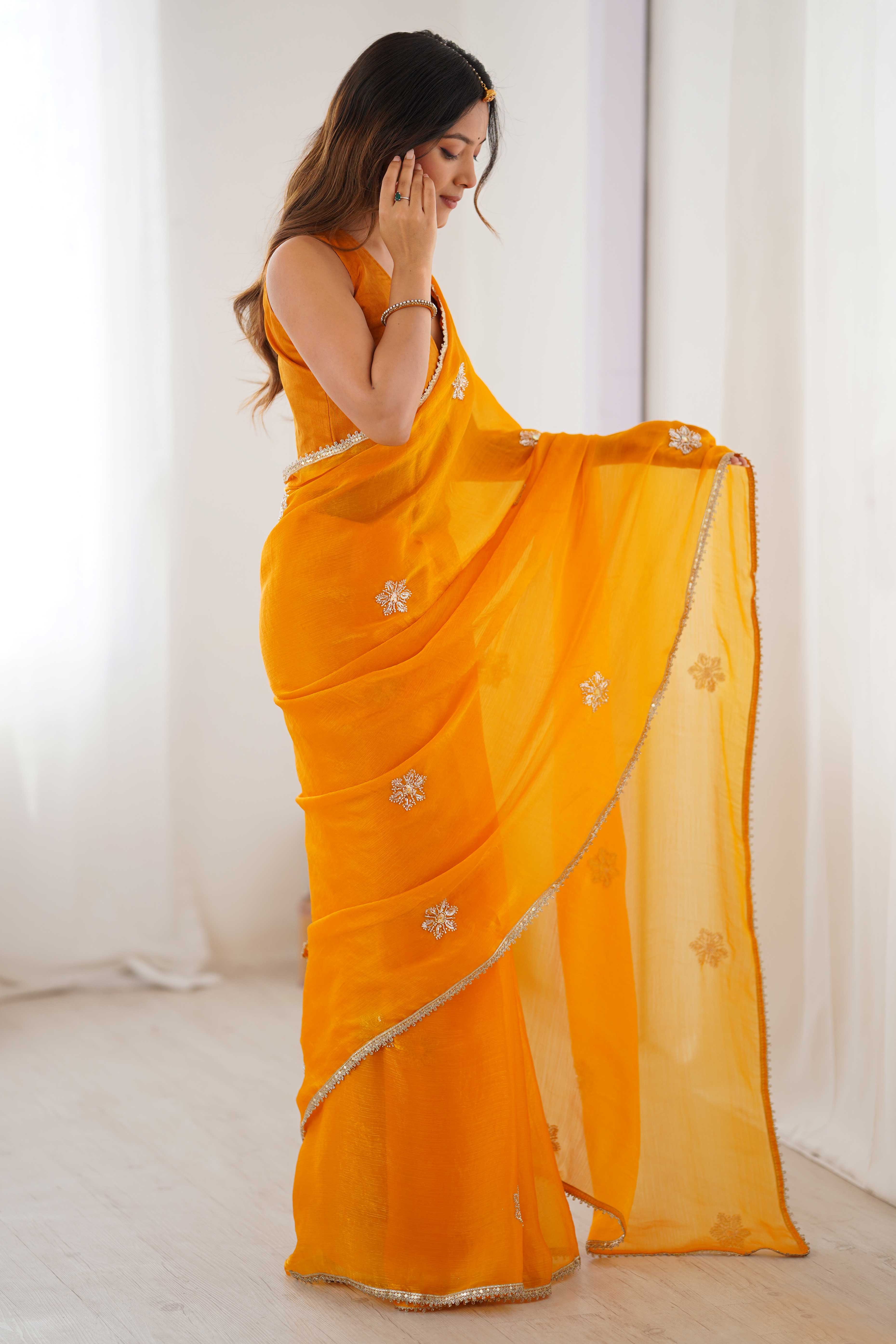 Mustard Yellow Organza Saree Embellished with Intricate Floral Work and Elegant Lace Detailing
