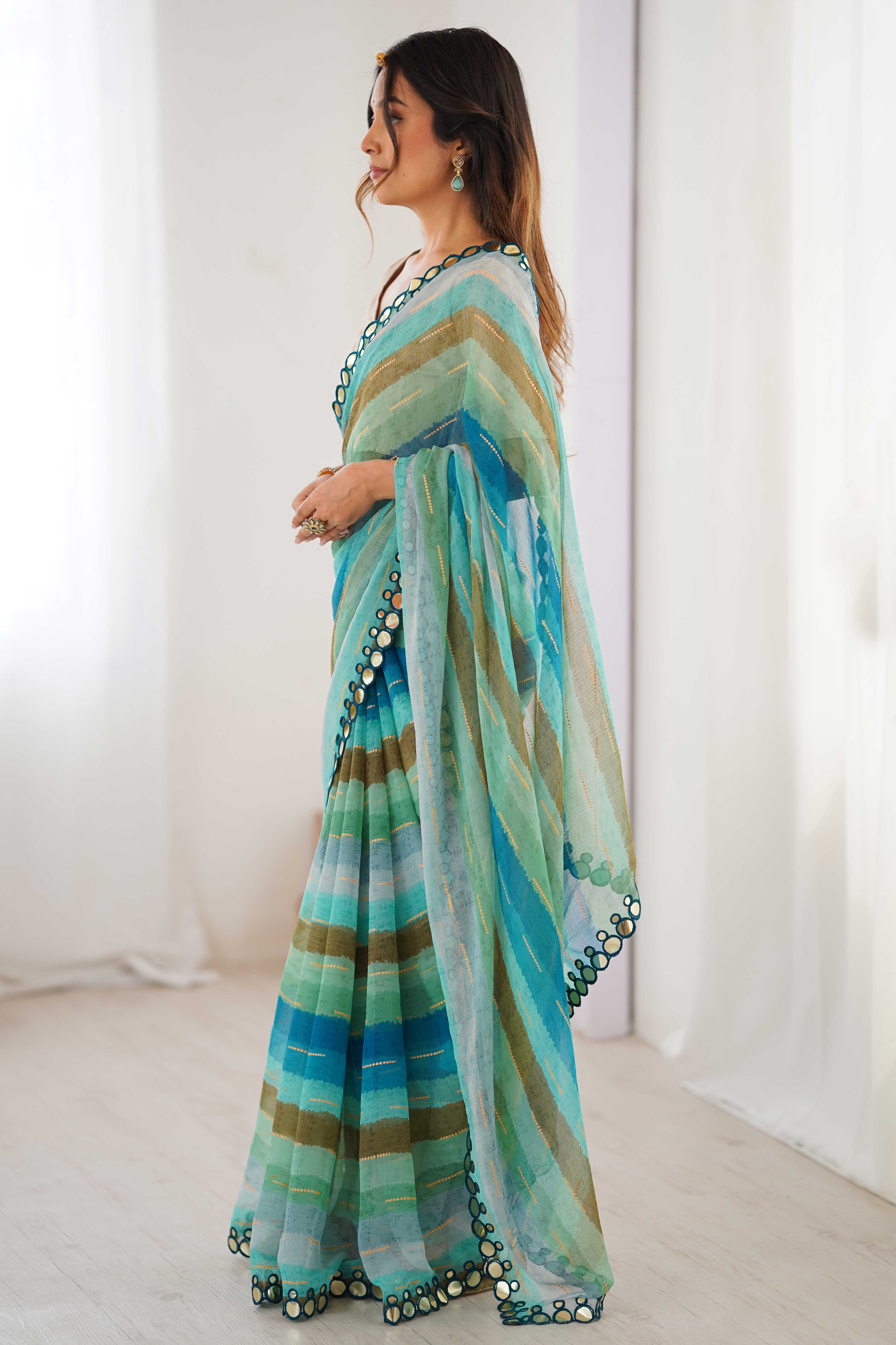 Soft Chiffon Turquoise Saree Featuring Classic Leheriya and Mirror Work Edges