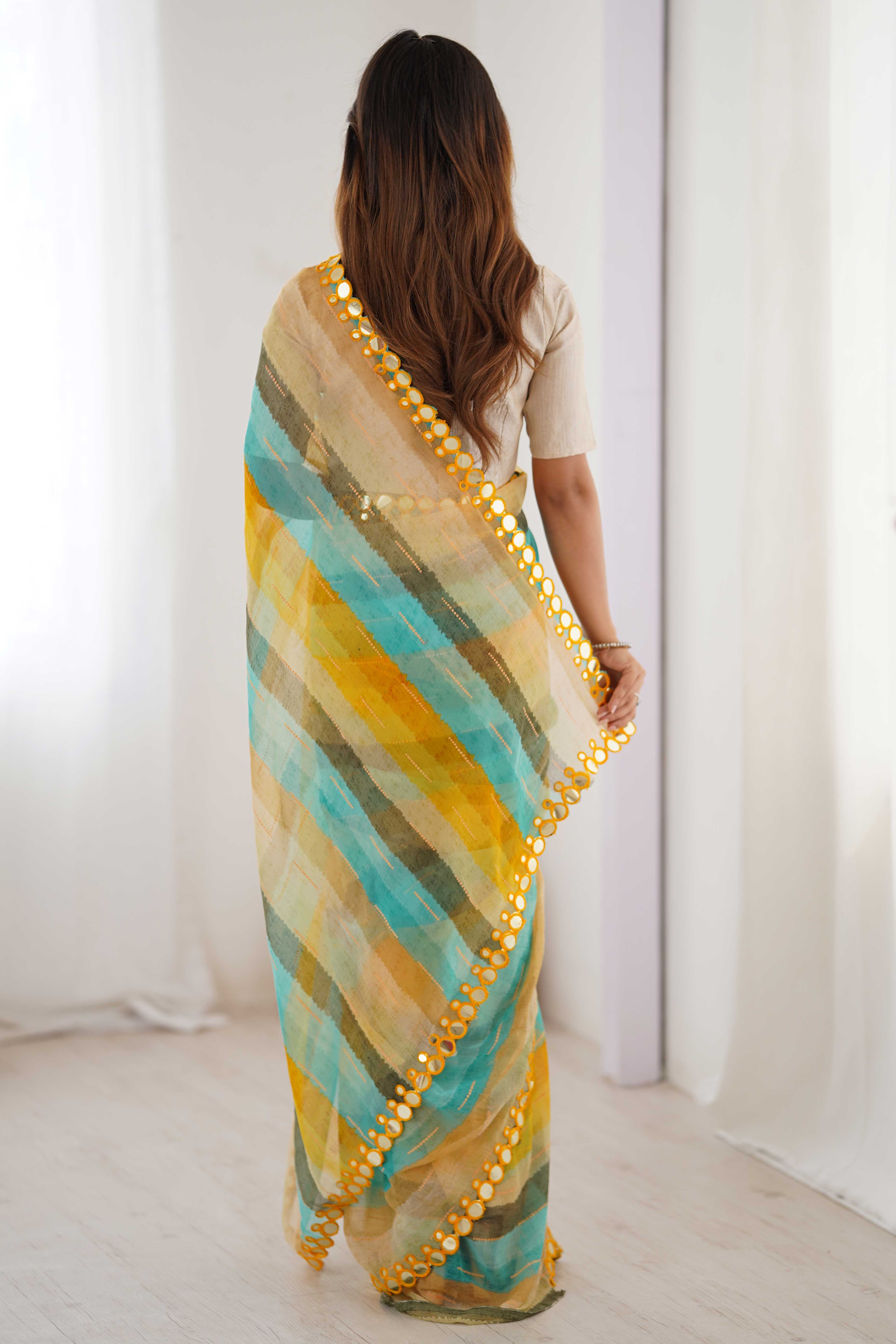 Soft Chiffon Yellow Saree Featuring Classic Leheriya and Mirror Work Edges