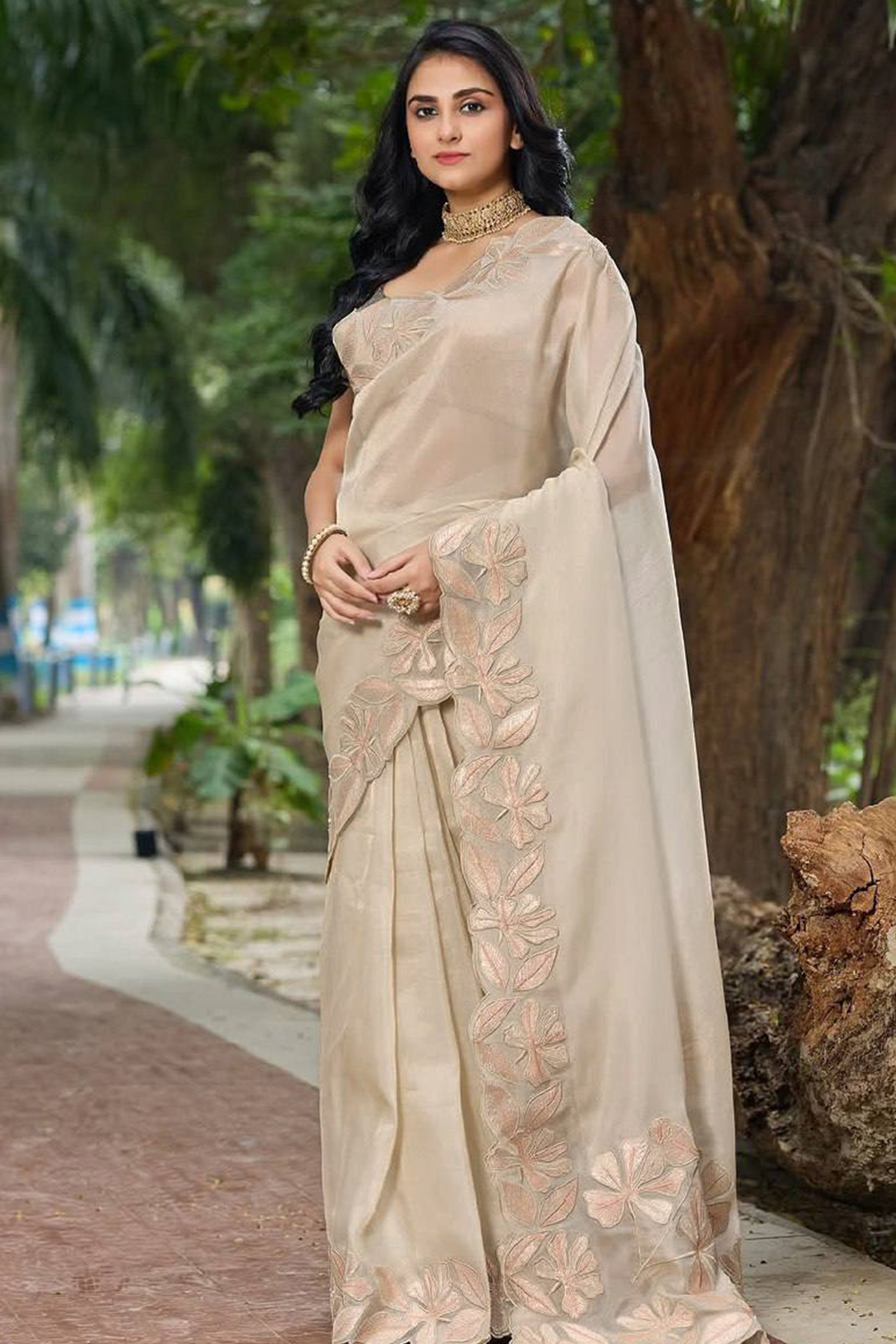 Sophisticated Beige Organza Silk Saree Beautified With Intricate Floral Embroidery & Sequins Work