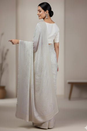 Lustrous White Organza Silk Saree Beautified With Paisley Embroidery & Glittering Sequins Work