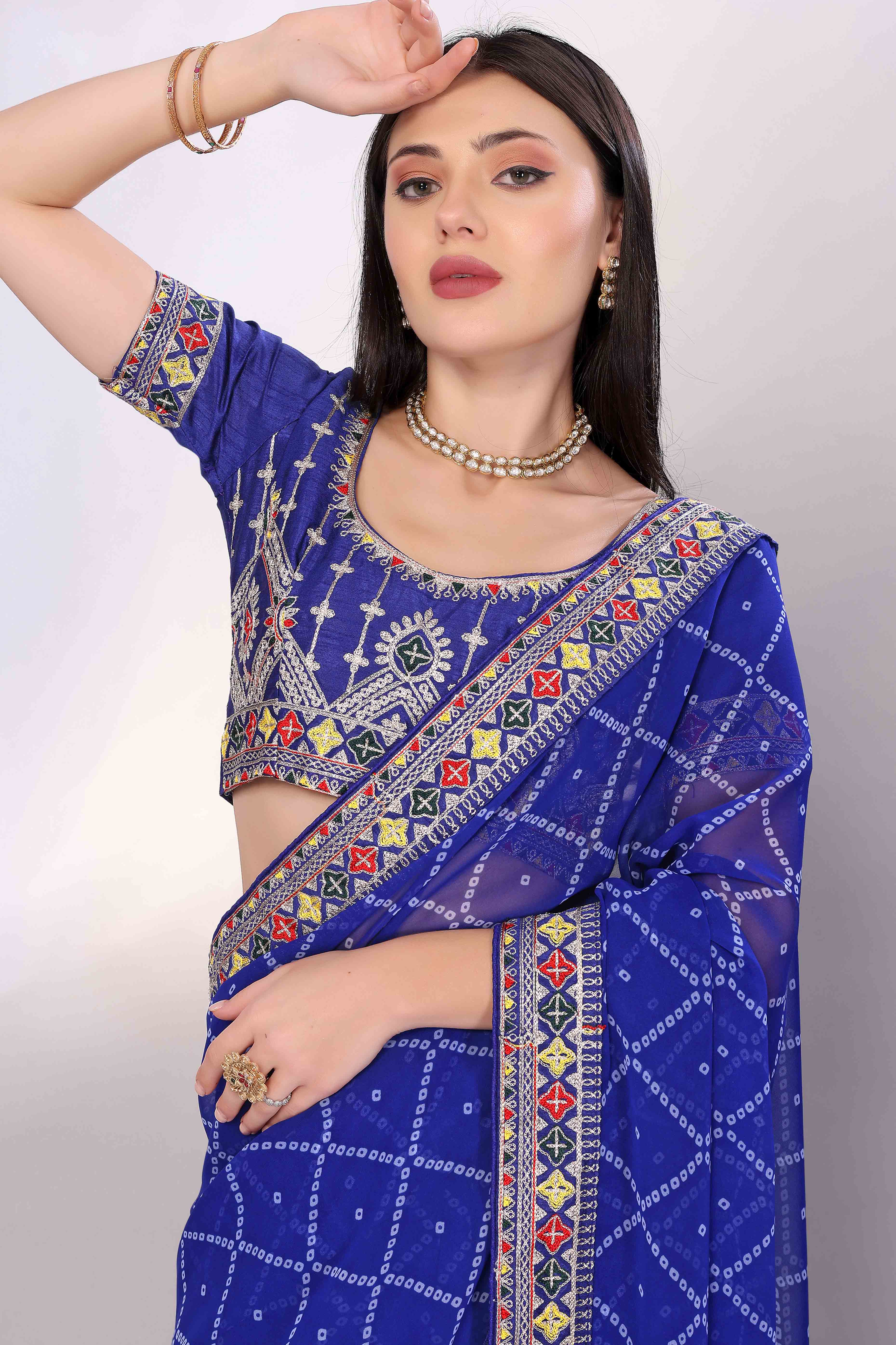 Blue Bandhani Printed Georgette Saree Framed With Elegant Embroidered Border