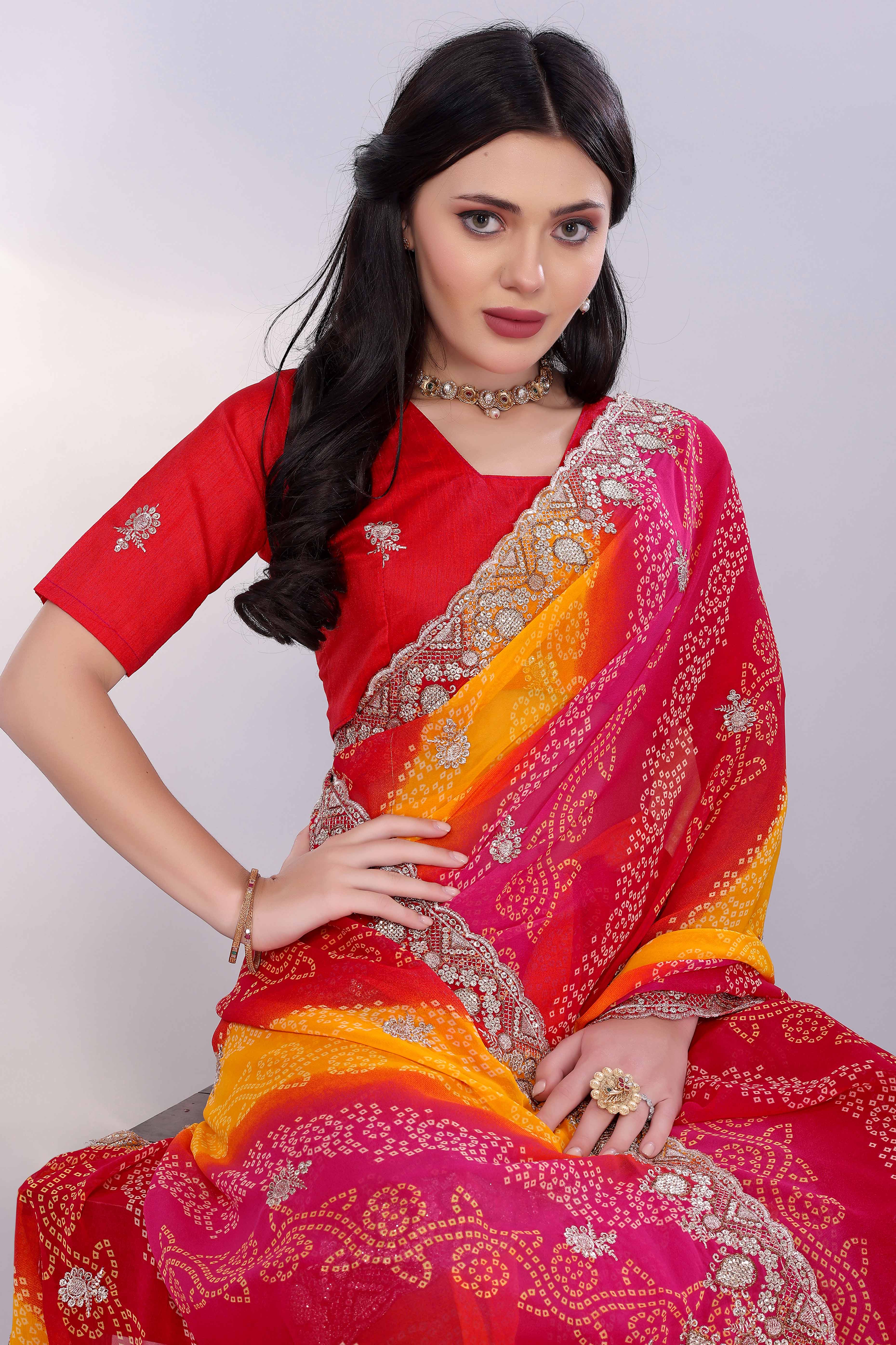 Pink Georgette Saree Showcasing Bandhani Print & Delicate Floral Sequins Embroidery