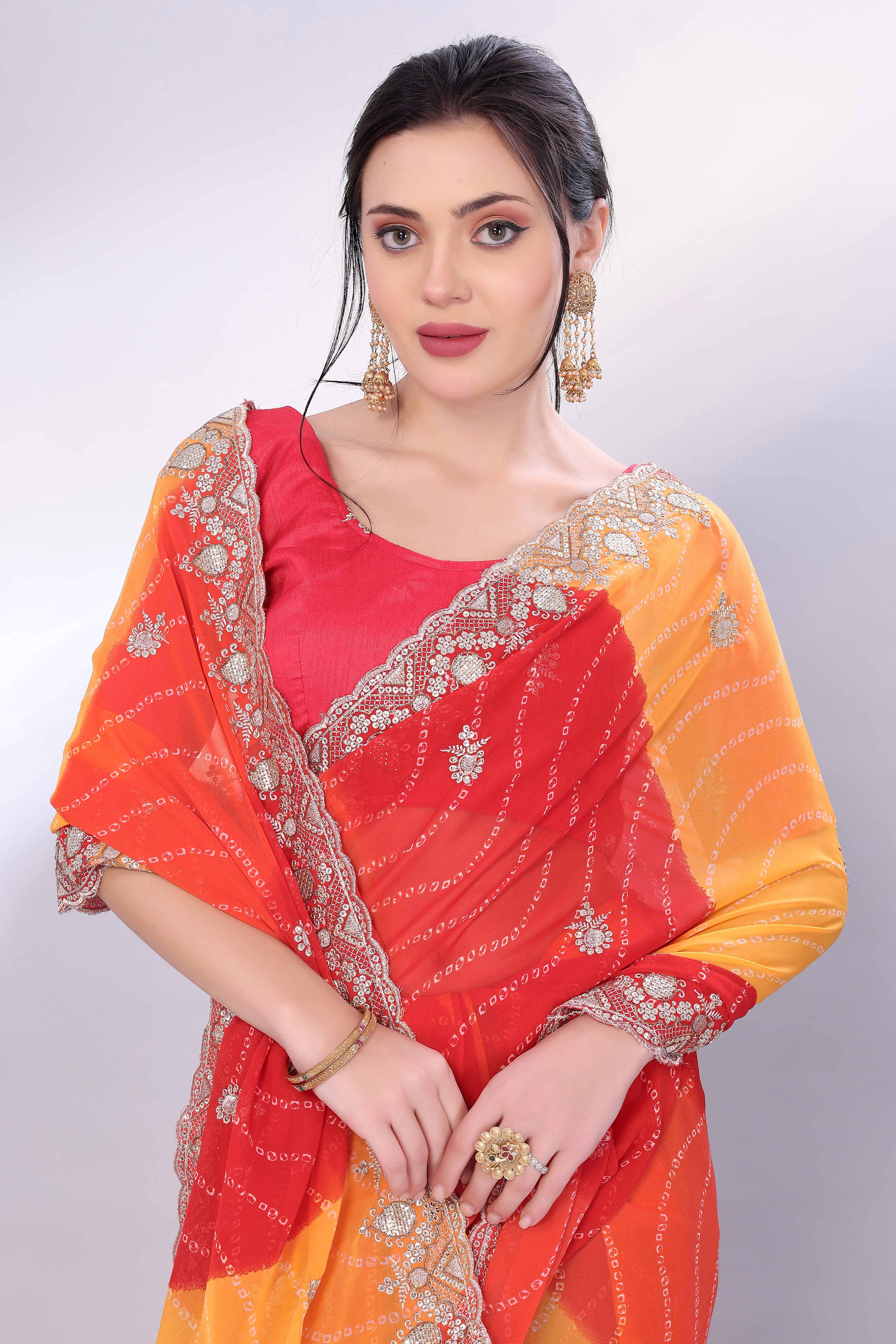 Red & Yellow Georgette Saree Showcasing Bandhani Print & Delicate Floral Sequins Embroidery